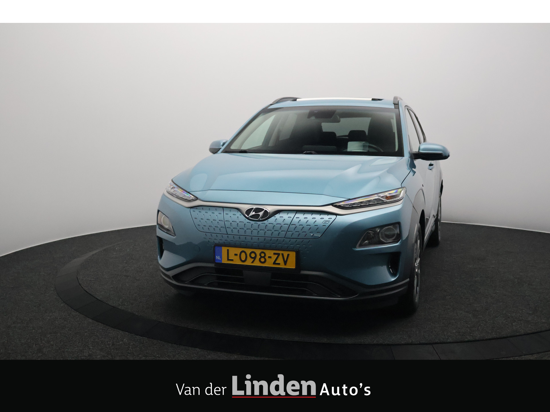 Hyundai Kona EV Fashion 64 kWh 3- Fase SOH 95,8% | Warmtepomp | Elektrisch Schuif/Kanteldak | Camera | Head-Up Display 2021 - voorkant