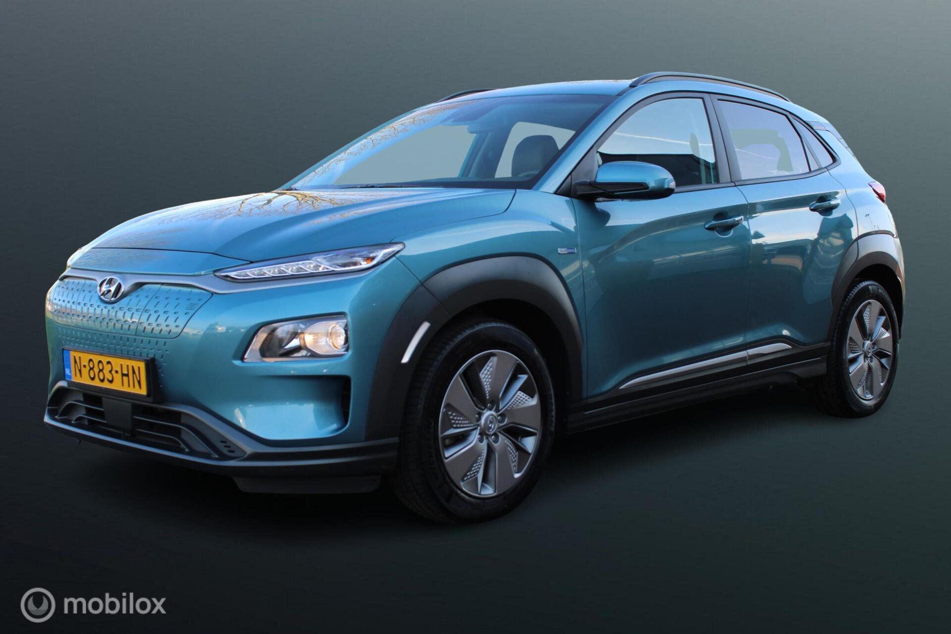 Hyundai Kona EV Fashion Design 64 kWh, 3-fasen, Stoel-stuurverwarming, SOH  99% , Pdc voor  + achter + Camera, Cruise, Clima, Navi, App Connect, Donker glas 2021 - voorkant