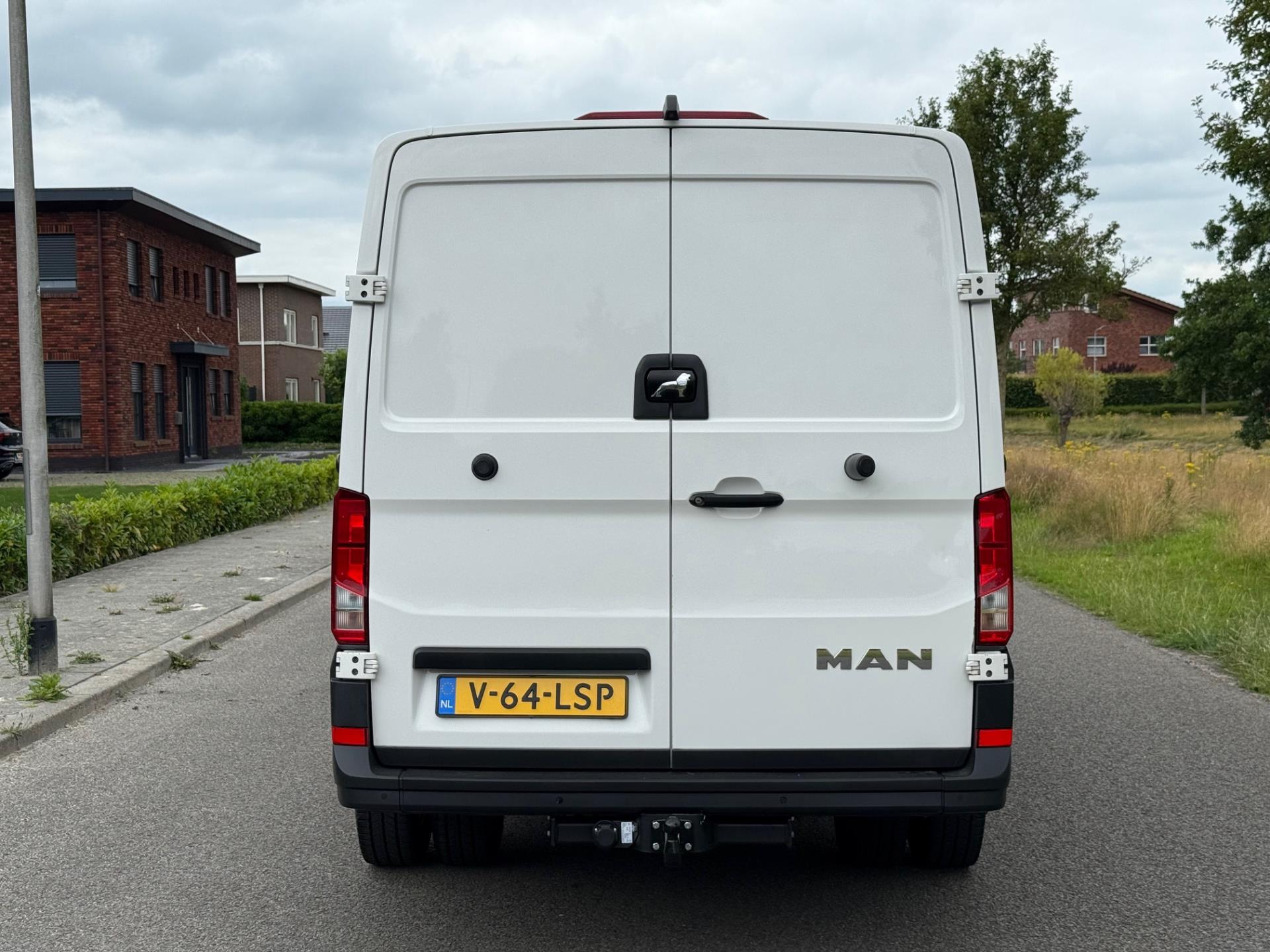 Foto van Man Tge