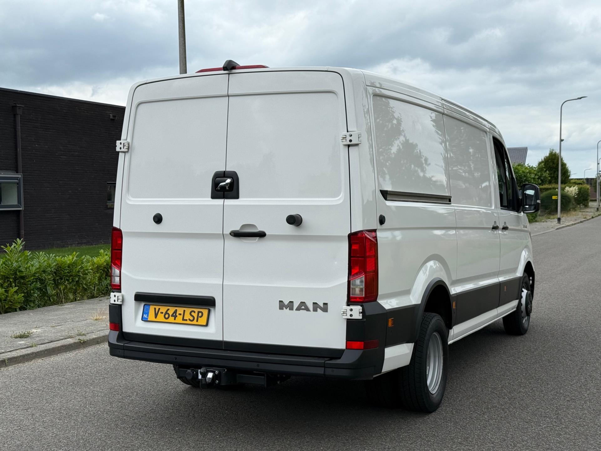 Foto van Man Tge