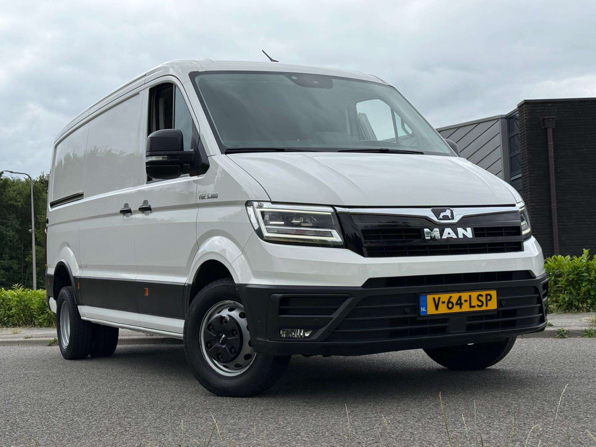 Foto van Man Tge