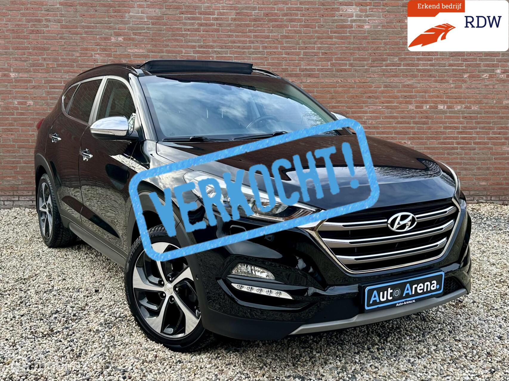 Hyundai Tucson 1.6 T-GDi Premium 4WD | Panorama dak | Stoelverw. | Stoelventilatie | Stuurverw. 2016 - voorkant