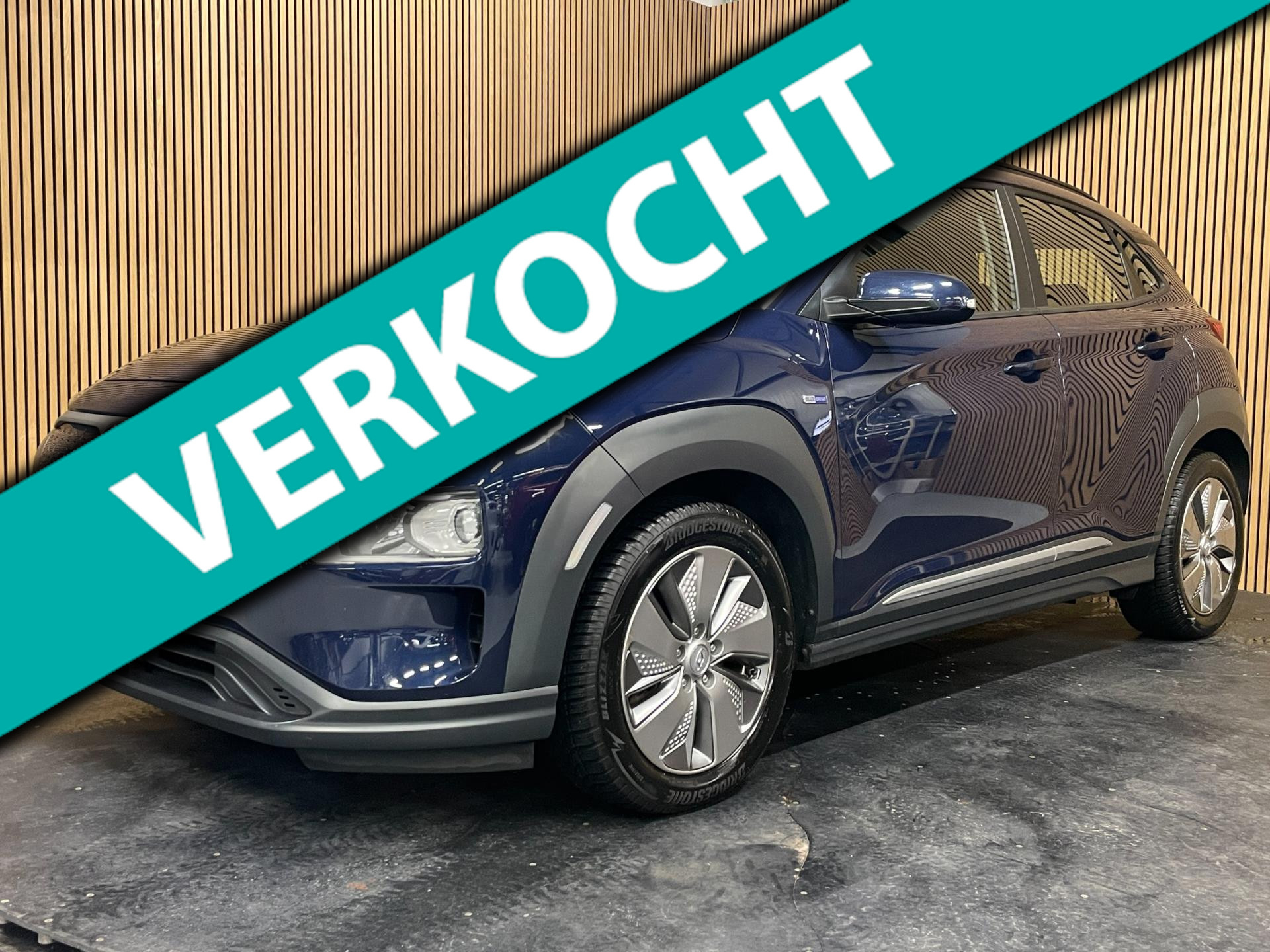 Hyundai Kona EV Comfort 64 kWh|3-FASE|100% SOH|KRELL|ACC|CARPLAY|CAMERA|CLIMATE,CRUISE CONTROL|1e EIG.|NL-AUTO|NAP|INCL.BTW| 2020 - voorkant