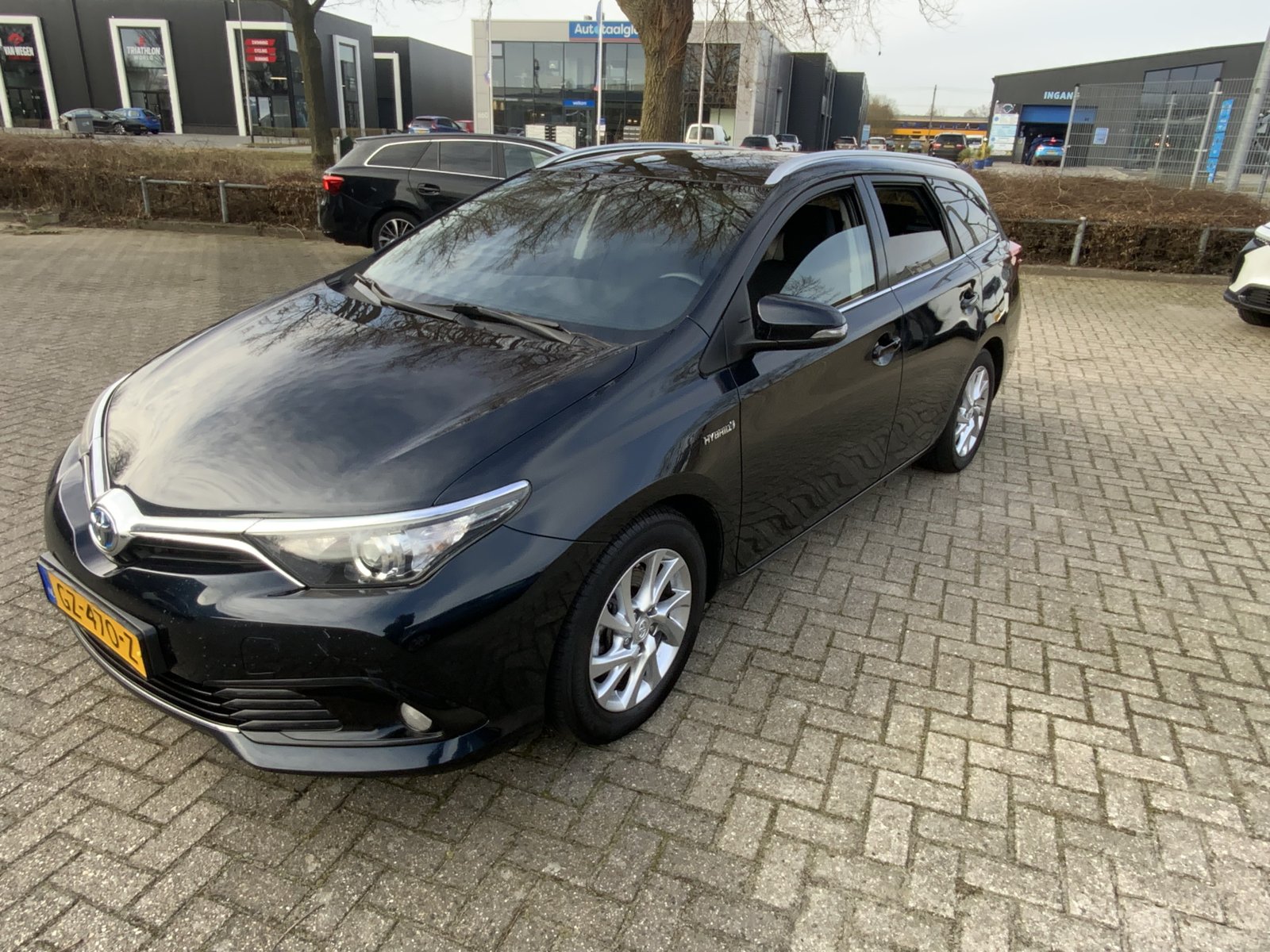 Toyota Auris Touring Sports 1.8 Hybr. Lease 2015 - voorkant