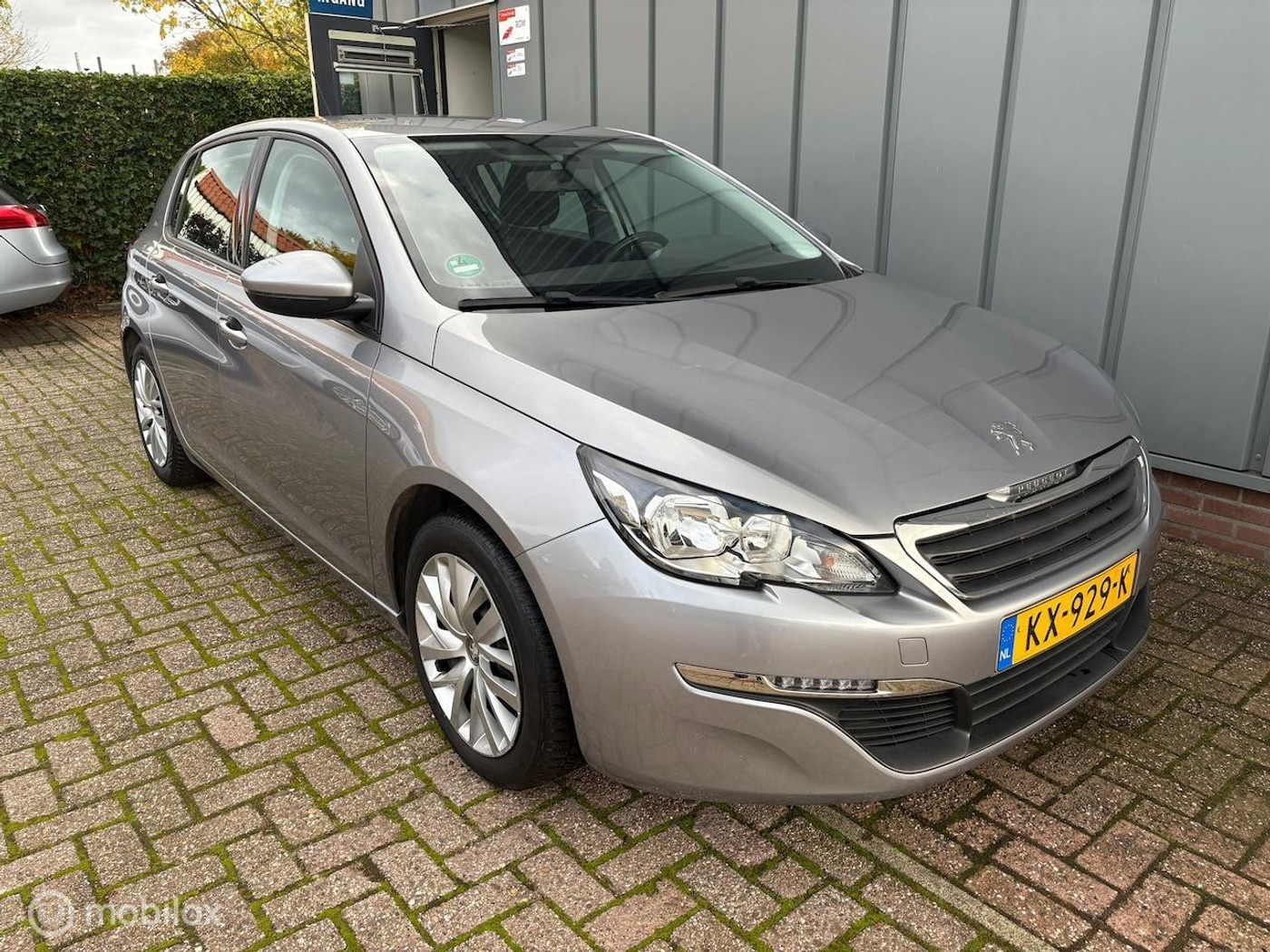 Peugeot 308 1.2 PureTech Blue Lease NAP//AIRCO//NAVI//CRUISE 2016 - voorkant