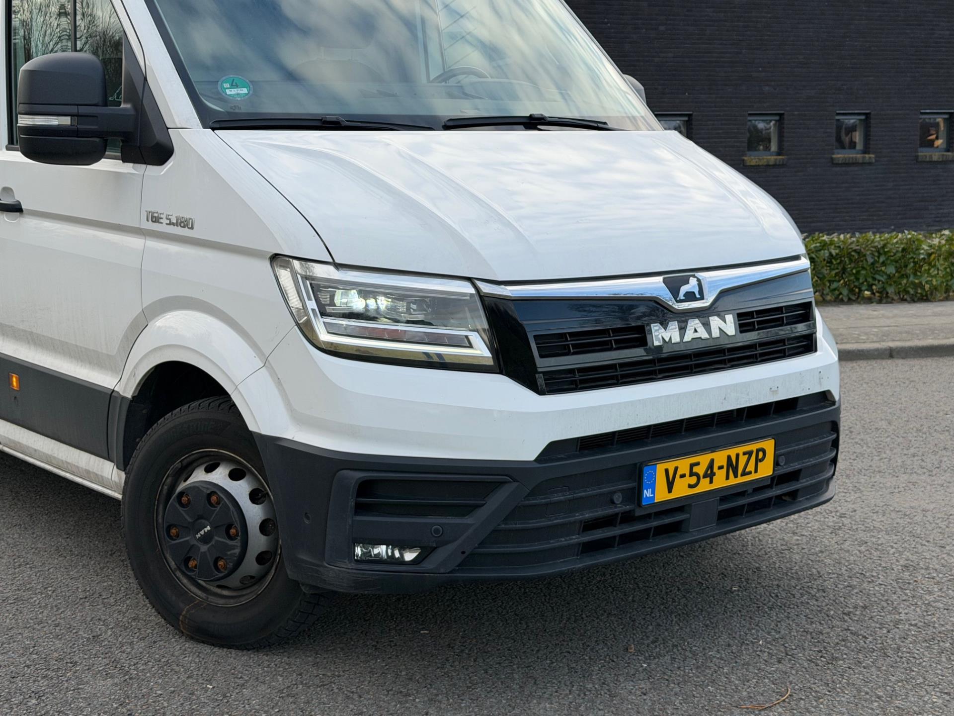 Foto van Man Tge