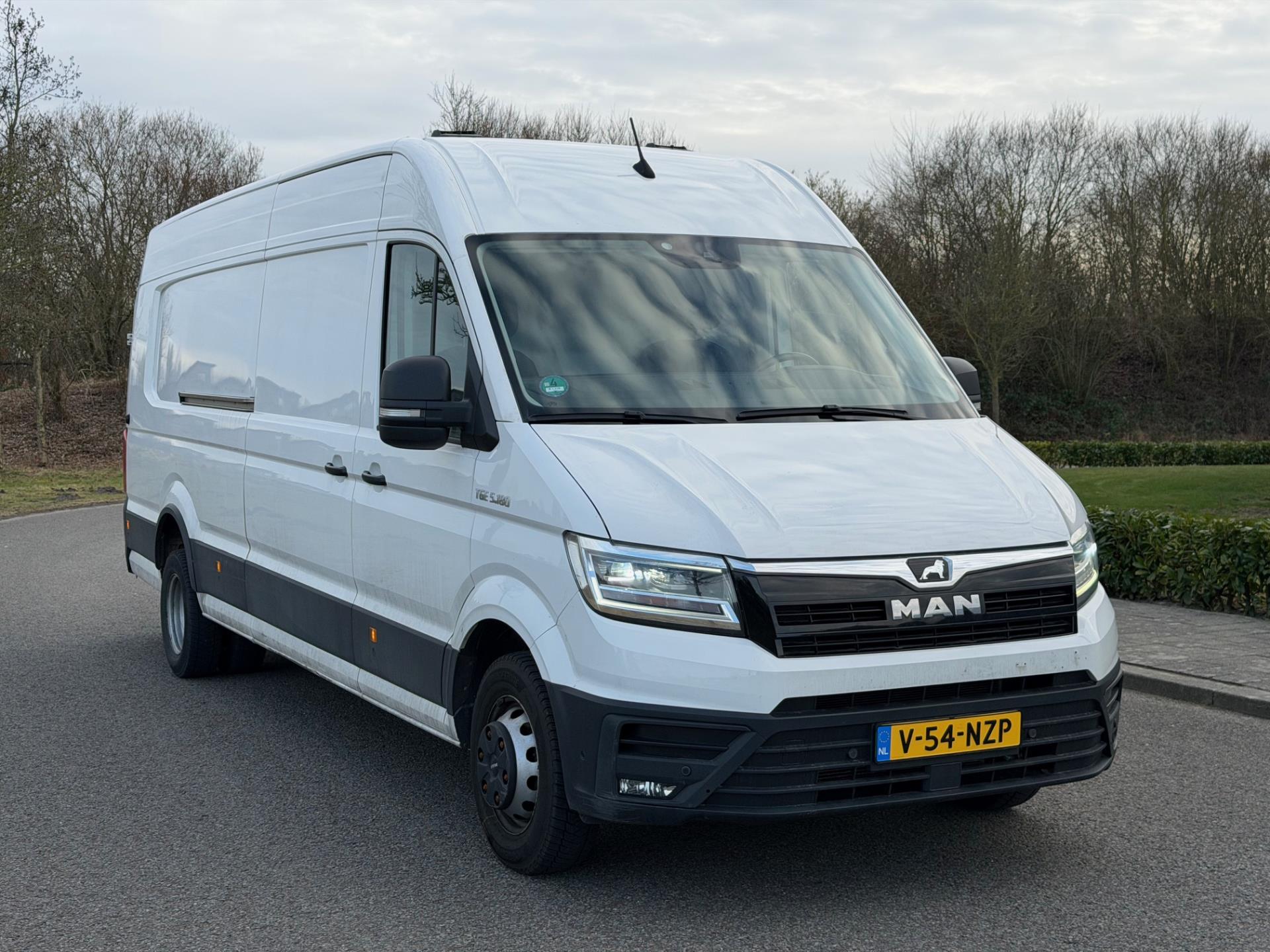 Foto van Man Tge