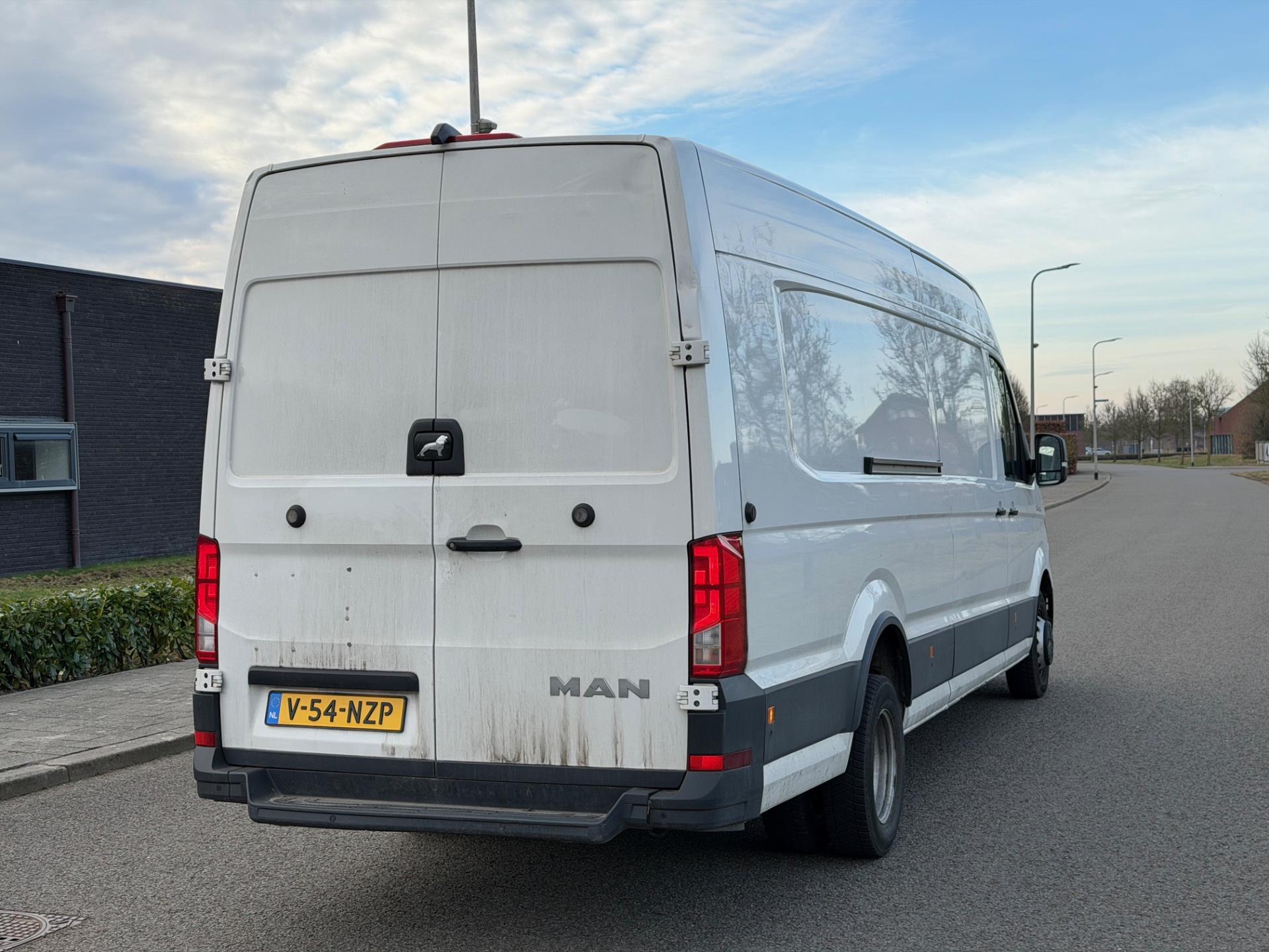 Foto van Man Tge