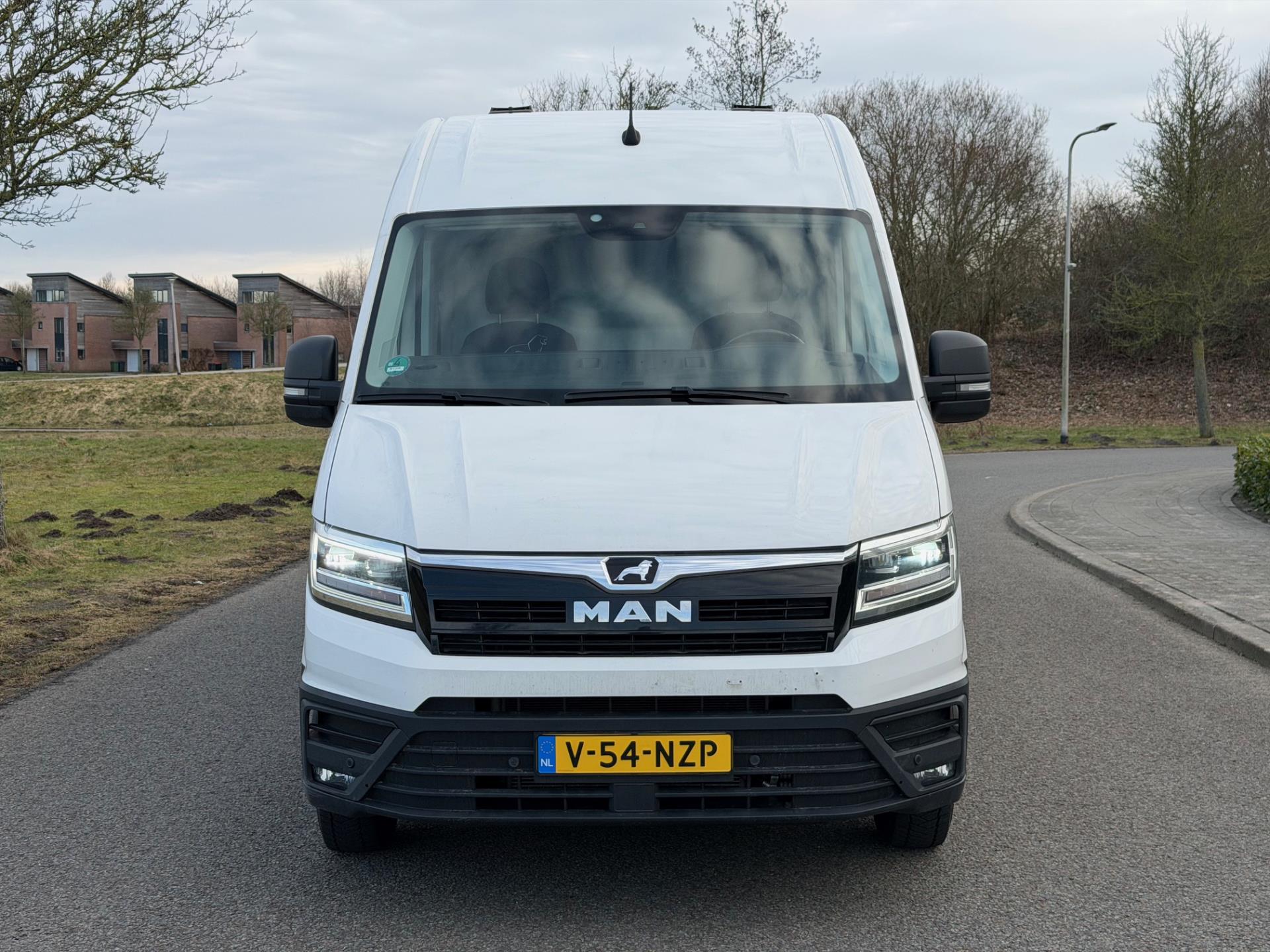 Foto van Man Tge