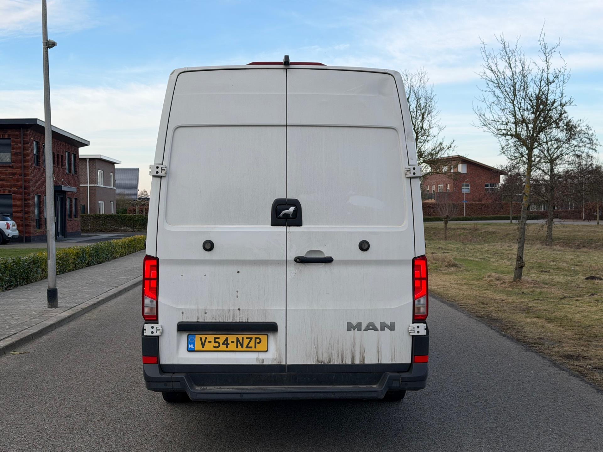 Foto van Man Tge