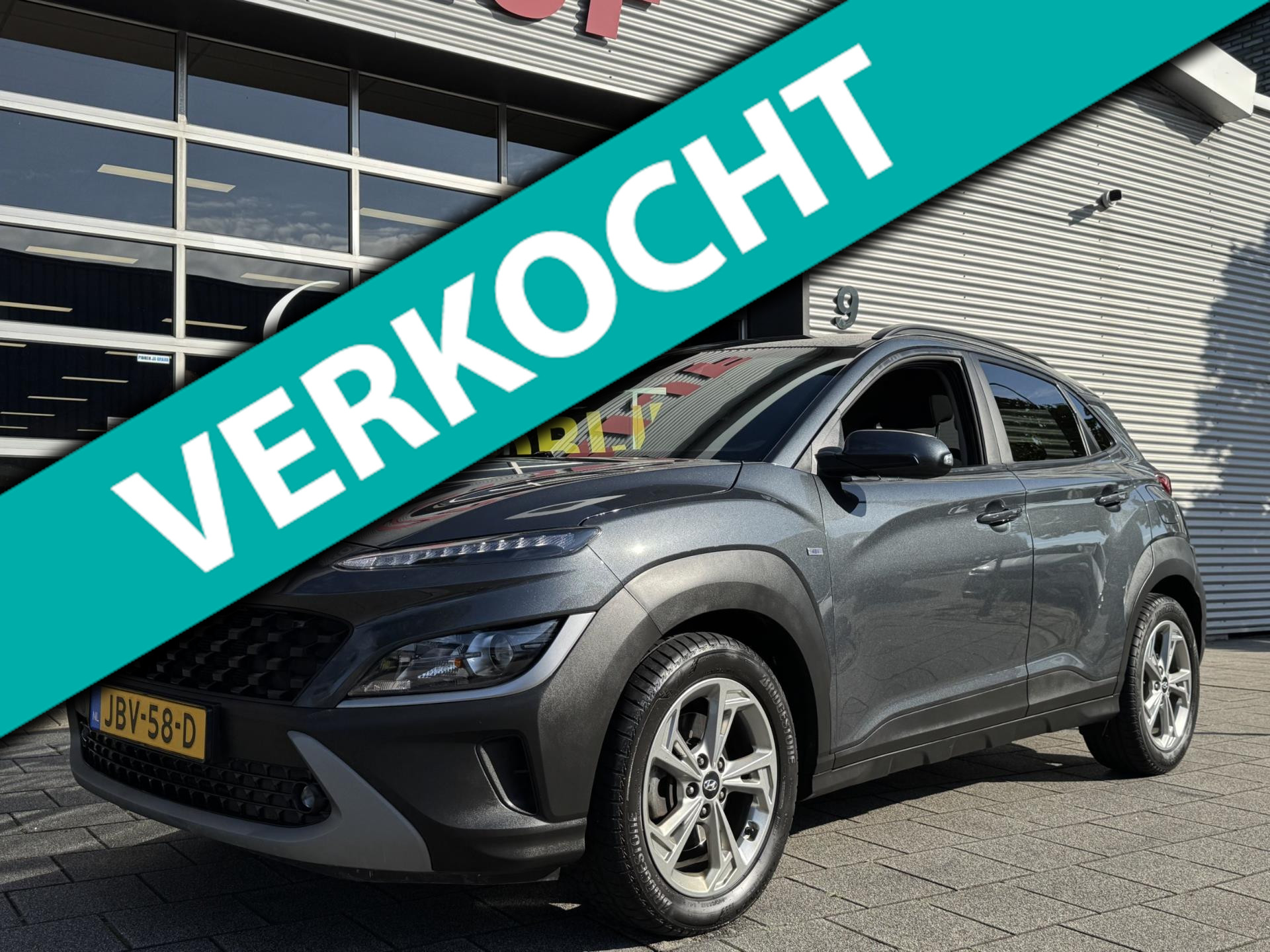 Hyundai Kona 1.0 T-GDI Edition 30 Hybride - Navigatie I Airco I LED I PDC / Camera I Sport velgen I Dealer onderhouden 2021 - voorkant