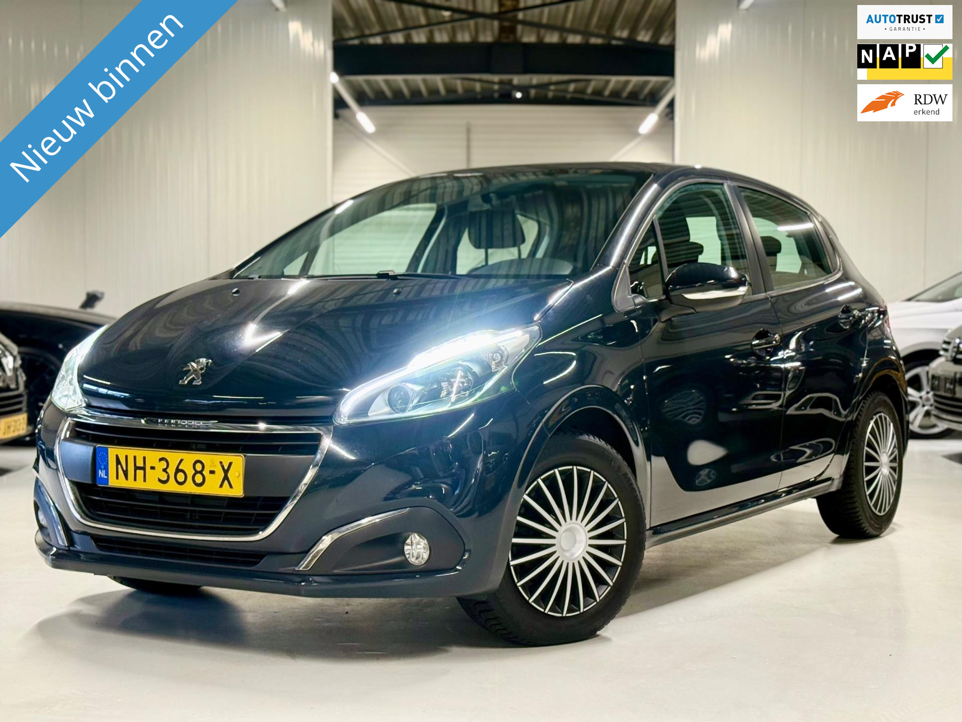 Peugeot 208 1.2 82PK Airco|Navigatie|Cruise control! 2017 - voorkant
