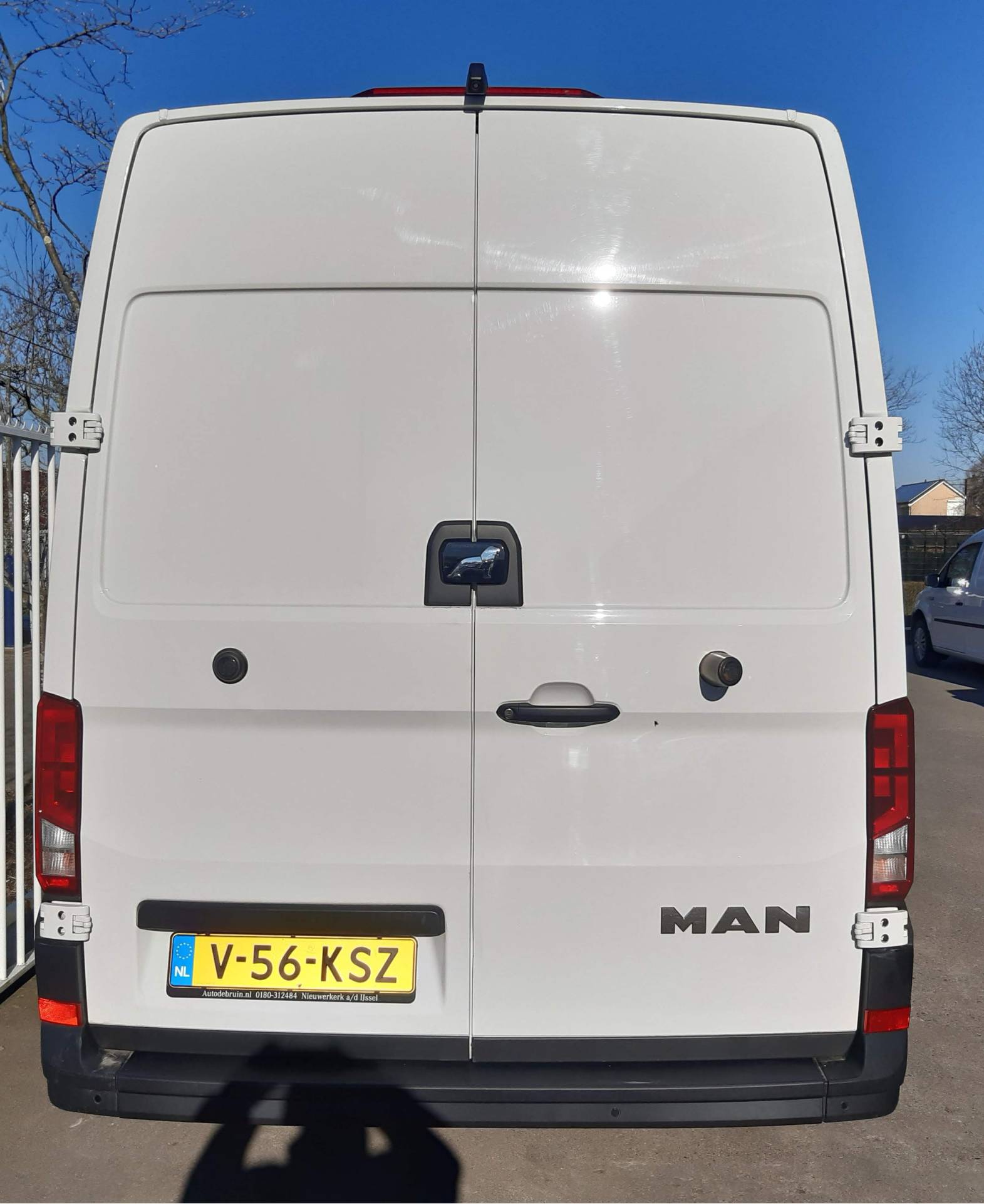 Foto van Man Tge