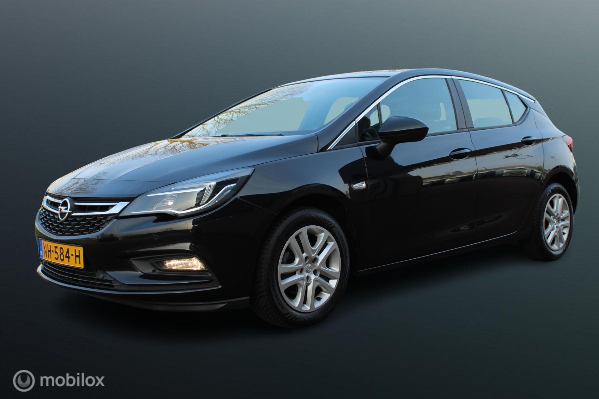 Opel Astra 1.0 Turbo Online Edition, Stoel stuur verwarming, Pdc voor + achter, Navi, Cruise, 16 inch LMV. 2017 - voorkant