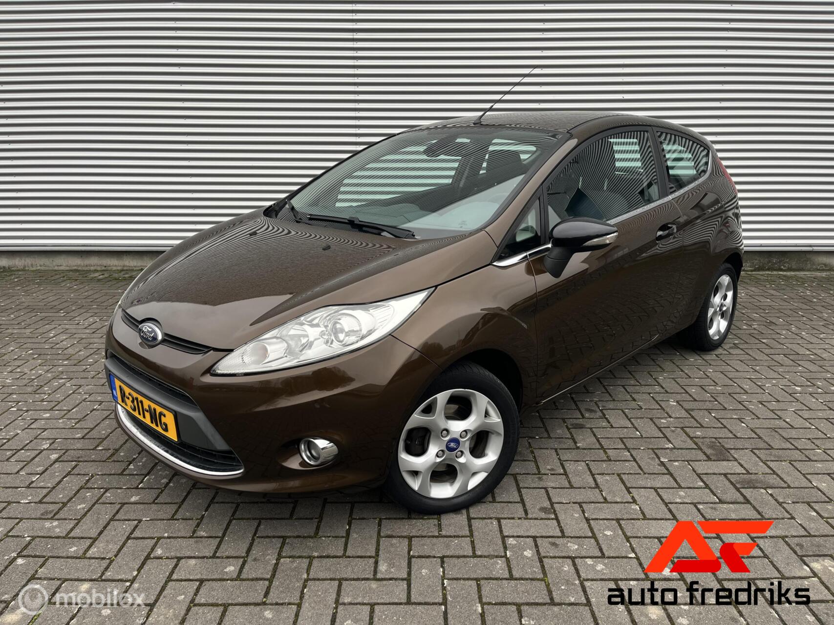 Ford Fiesta 1.25 Titanium | Stoelverwarming | 2011 - voorkant