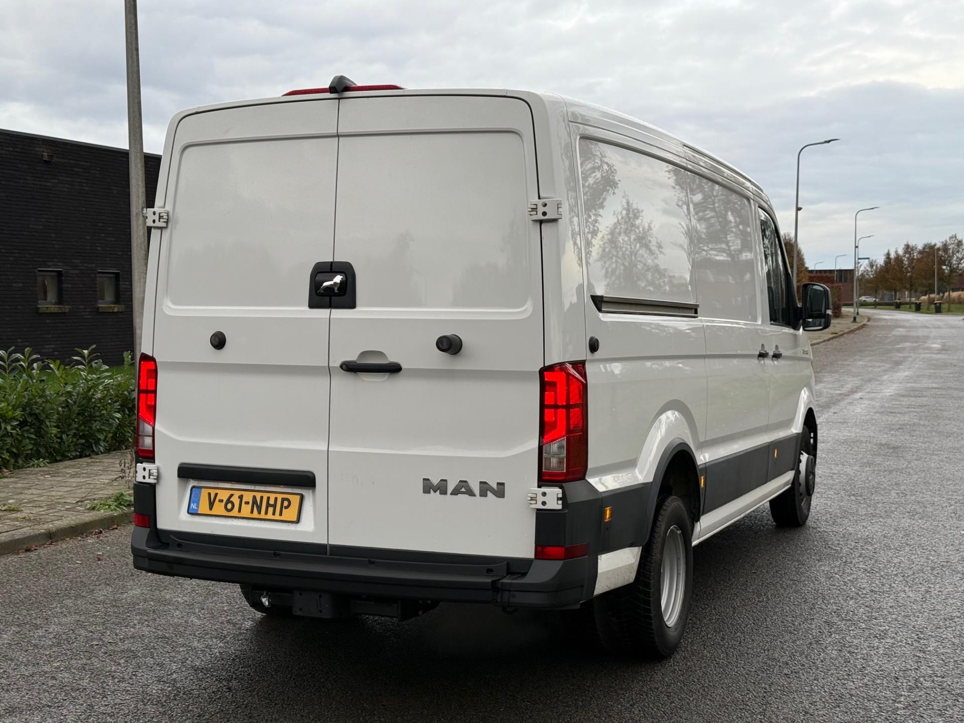 Foto van Man Tge