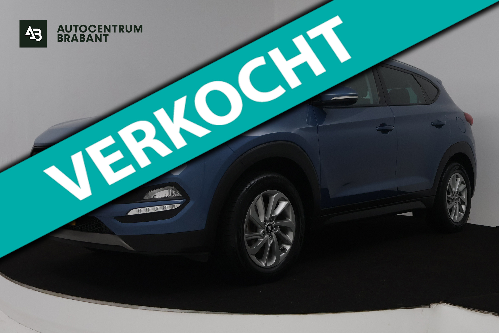 Hyundai Tucson 1.6 GDi Comfort (TREKHAAK, STOEL/STUUR VERWARMING, ACHTERUITRIJCAMERA, NAVIGATIE, PARKEERSENSOREN) 2015 - voorkant