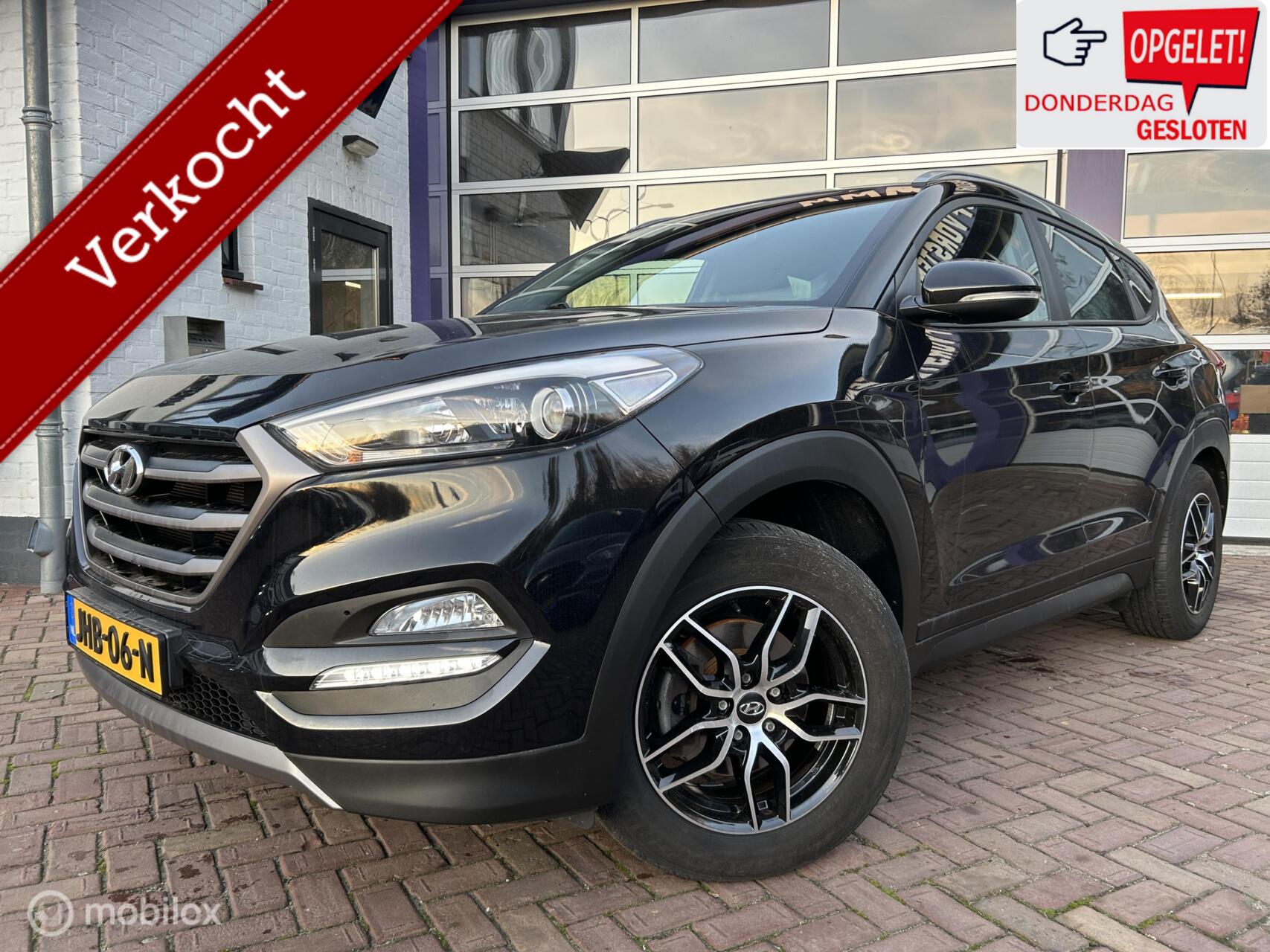 Hyundai Tucson 1.6 GDi i-Motion * LPG G3 * NAVIGATIE * LM * 2016 - voorkant