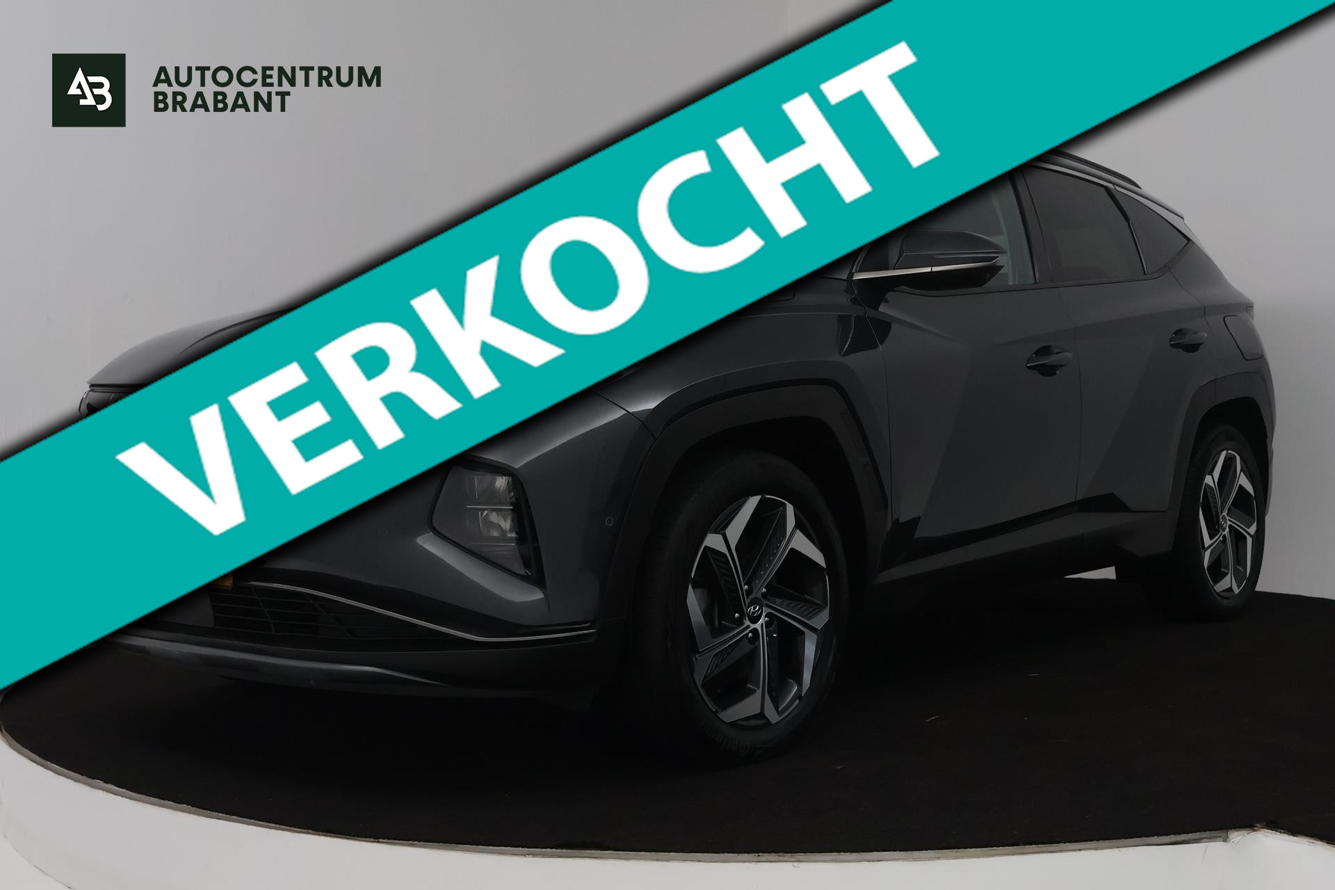 Hyundai Tucson 1.6 T-GDI HEV Premium (TREKHAAK, ADAPTIVE CRUISE, ELEKT. STOELEN, STUUR-/STOELVERWARMING, 1e EIGENAAR) 2021 - voorkant