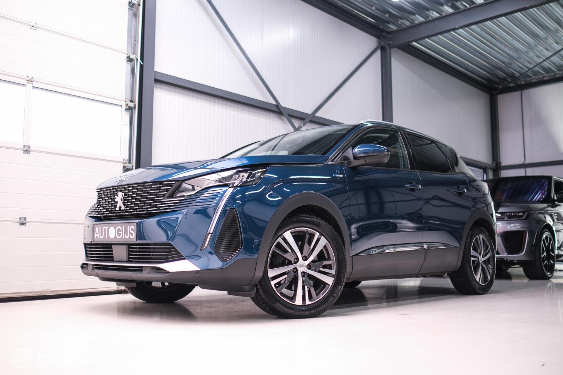 Peugeot 3008 1.6 HYbrid 225 pk Allure | Trekhaak | NL auto | Camera | Leder | HUD | rijklaaprijs | All season banden | 2021 - voorkant
