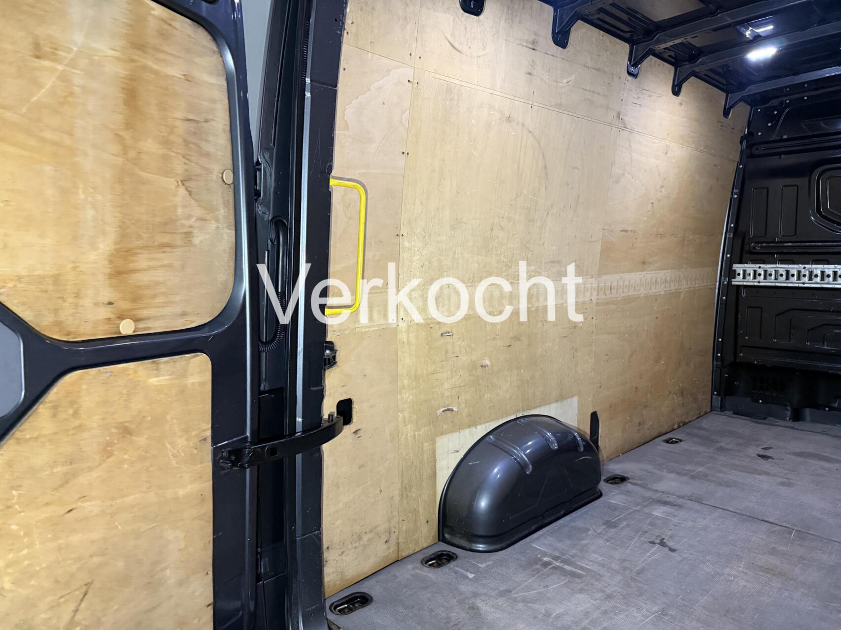 Foto van Man Tge