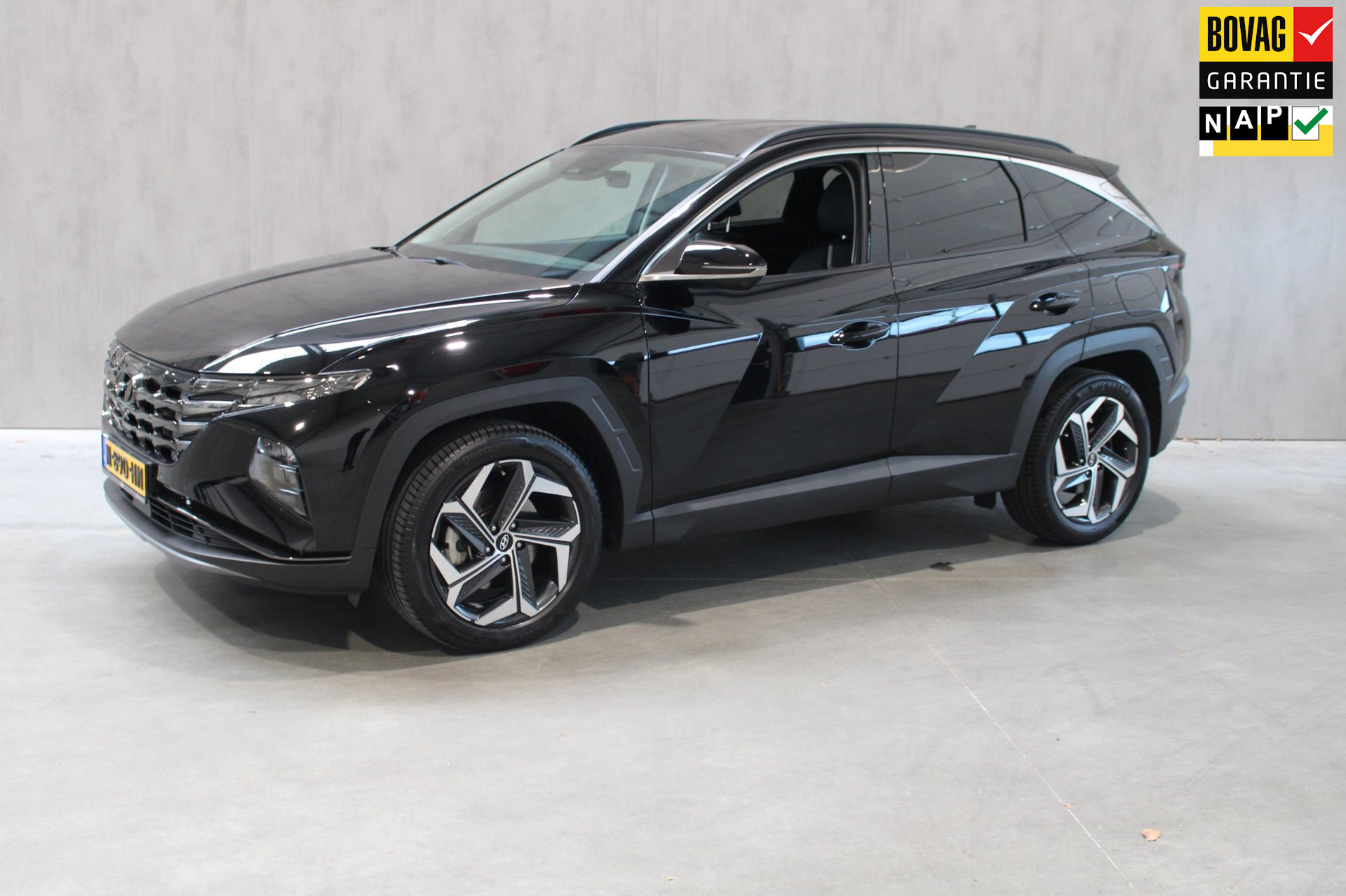 Hyundai Tucson 1.6 T-GDI HEV Premium Leer/Camera/Trekhaak prijs is rijklaar incl bovag 2021 - voorkant