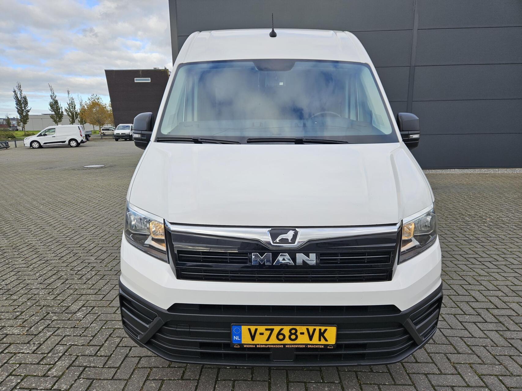 Foto van Man Tge