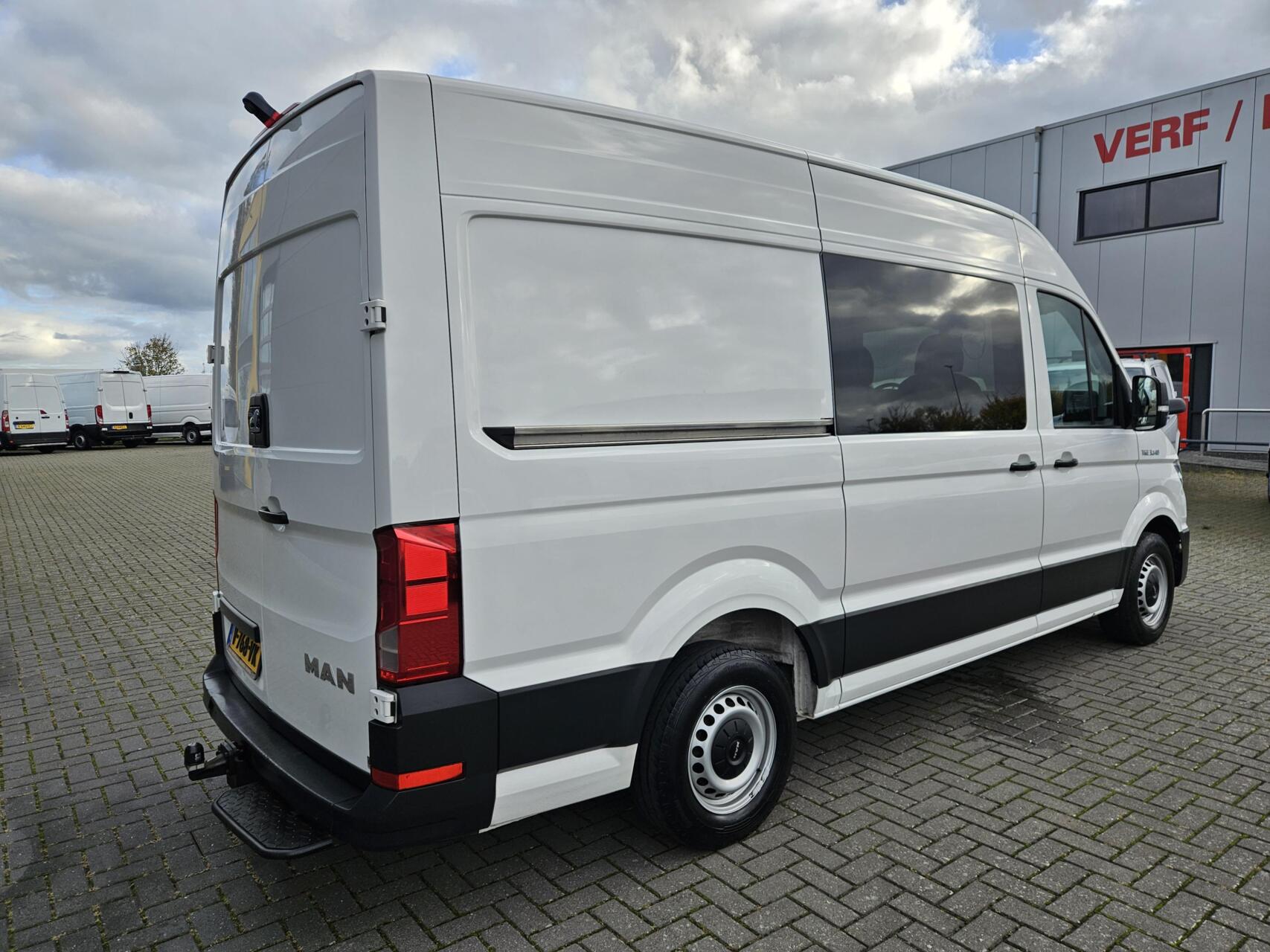 Foto van Man Tge