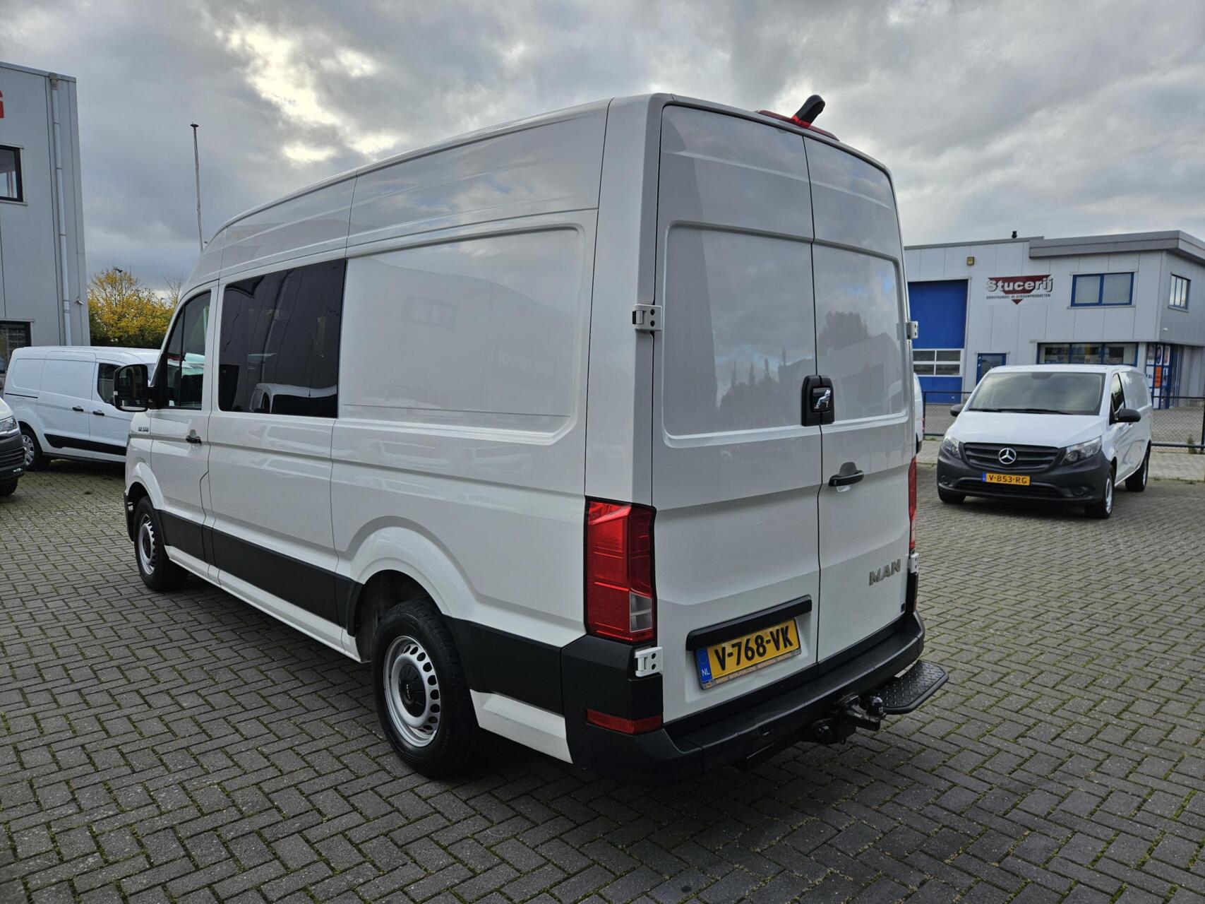 Foto van Man Tge