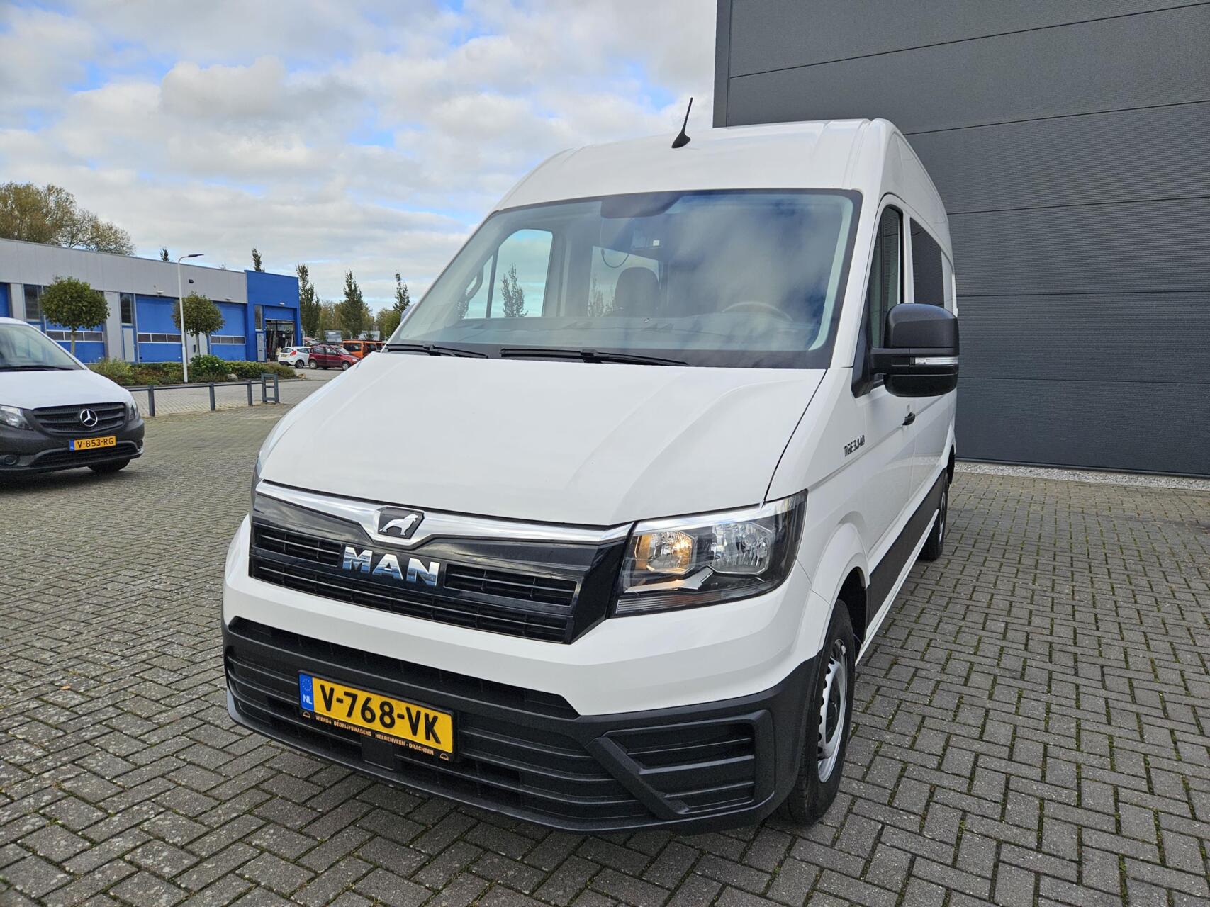 Foto van Man Tge