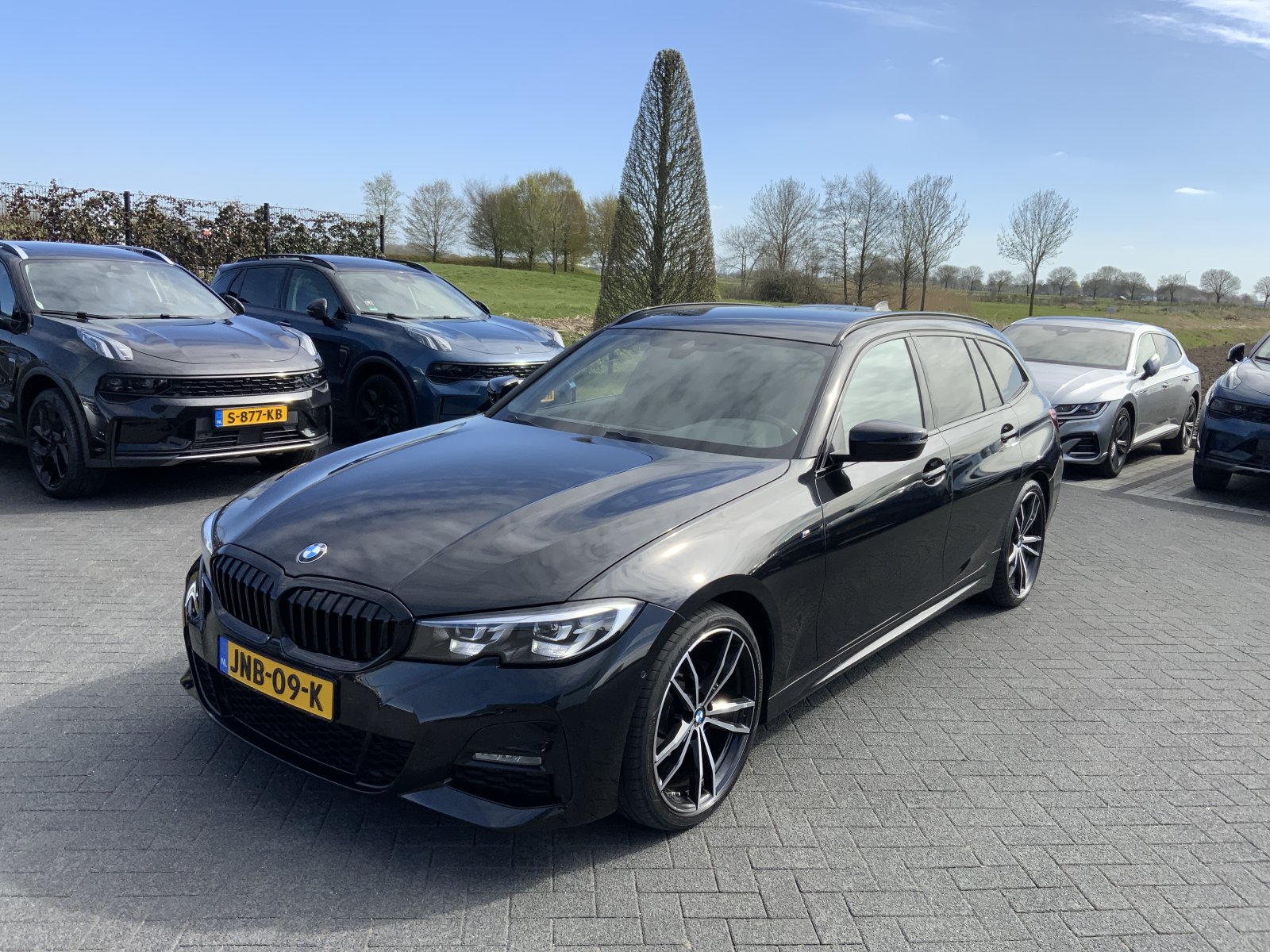 BMW 3-serie Touring 318i High Executive 2021 - voorkant