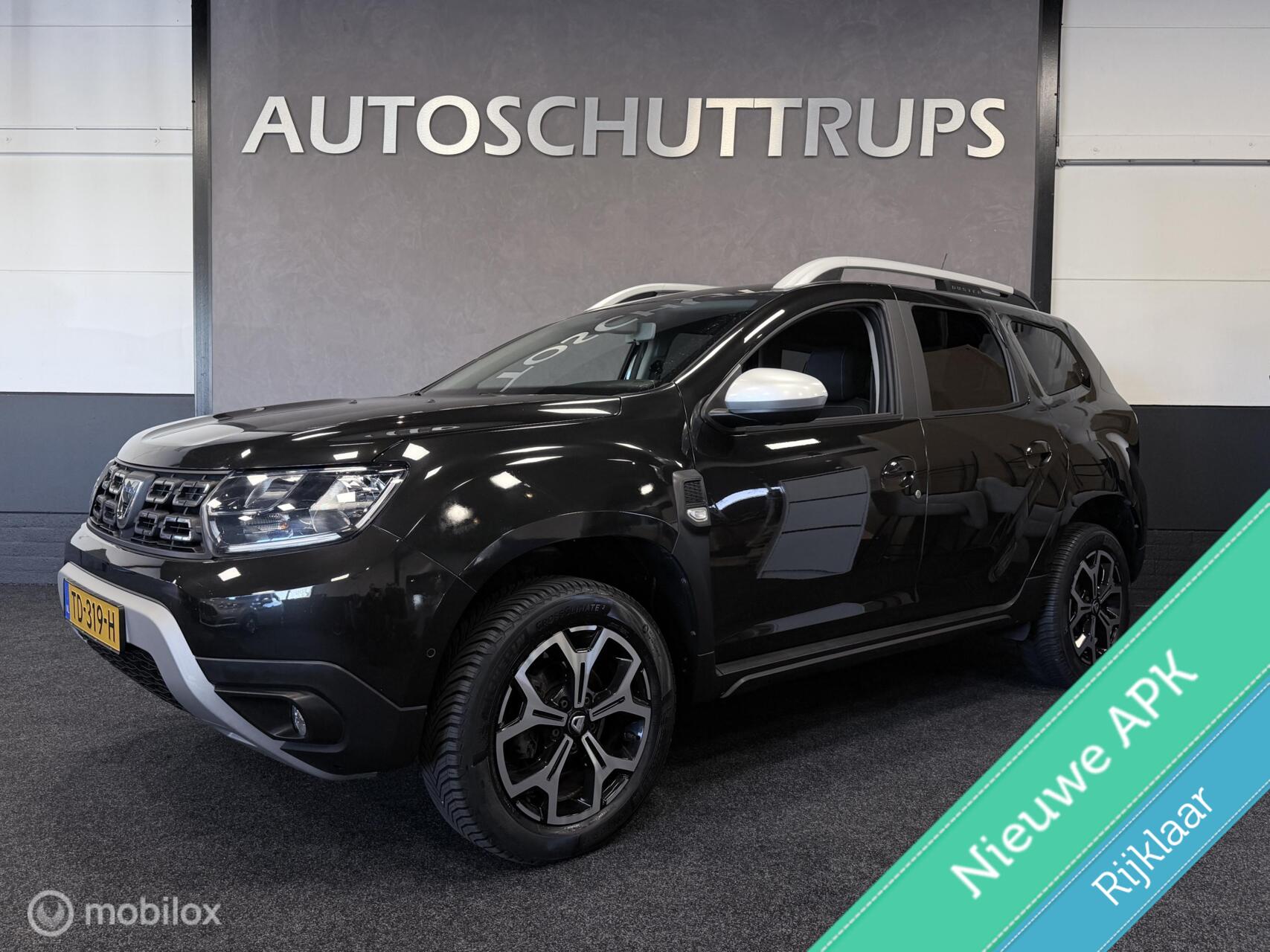 Dacia Duster 1.2 TCe Prestige LEER / NAVI / CLIMA / CRUISE / LED / TREKHAAK / 360 CAMERA 2018 - voorkant