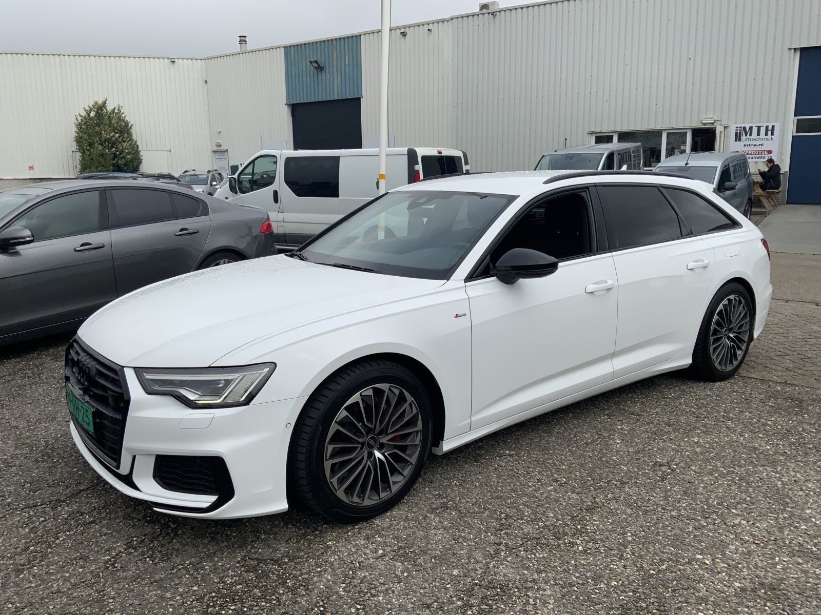 Audi A6 Avant 55 TFSI e q. PLS Cmp 2021 - voorkant