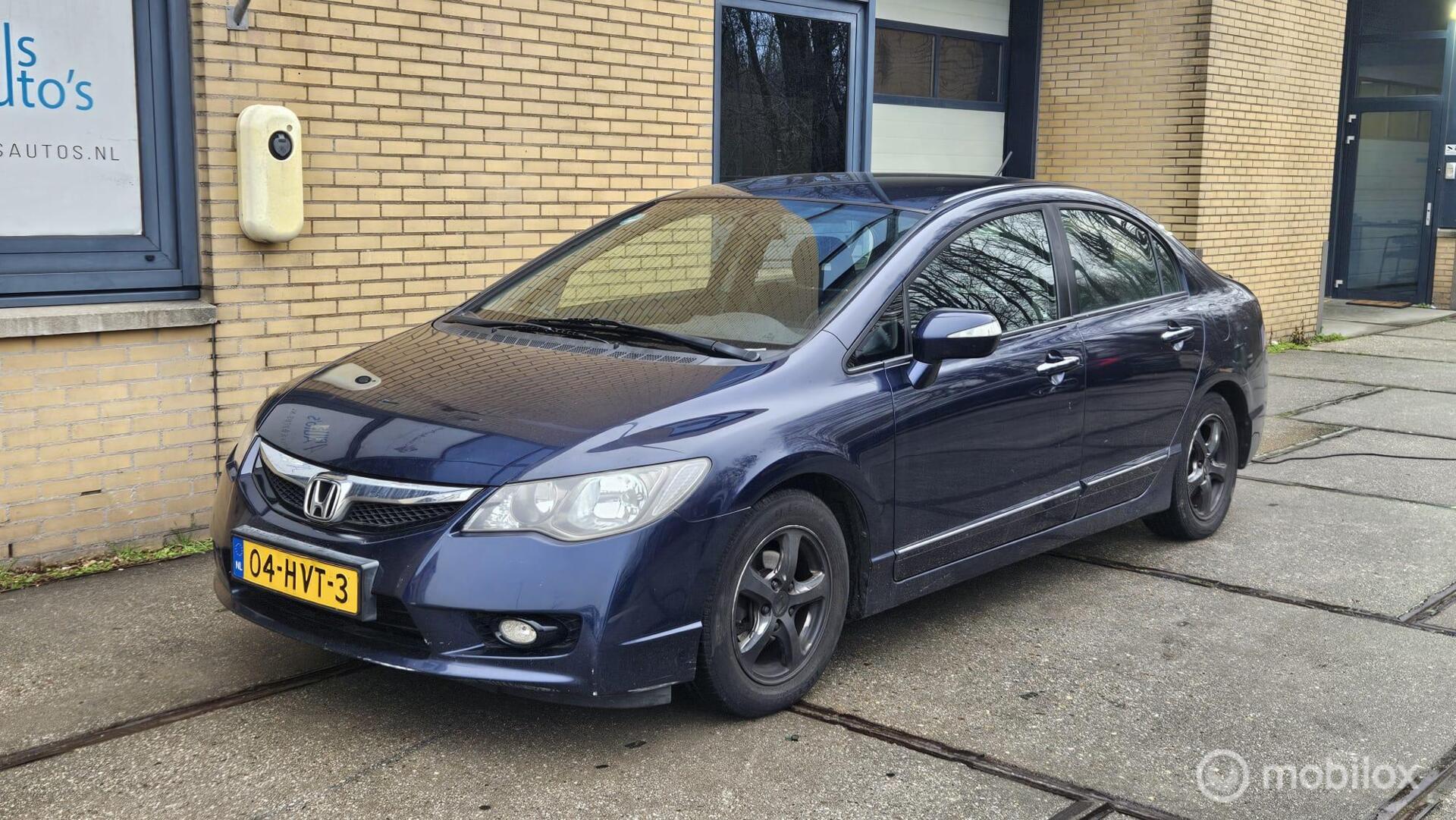 Foto van HONDA CIVIC 4DR HYBRID