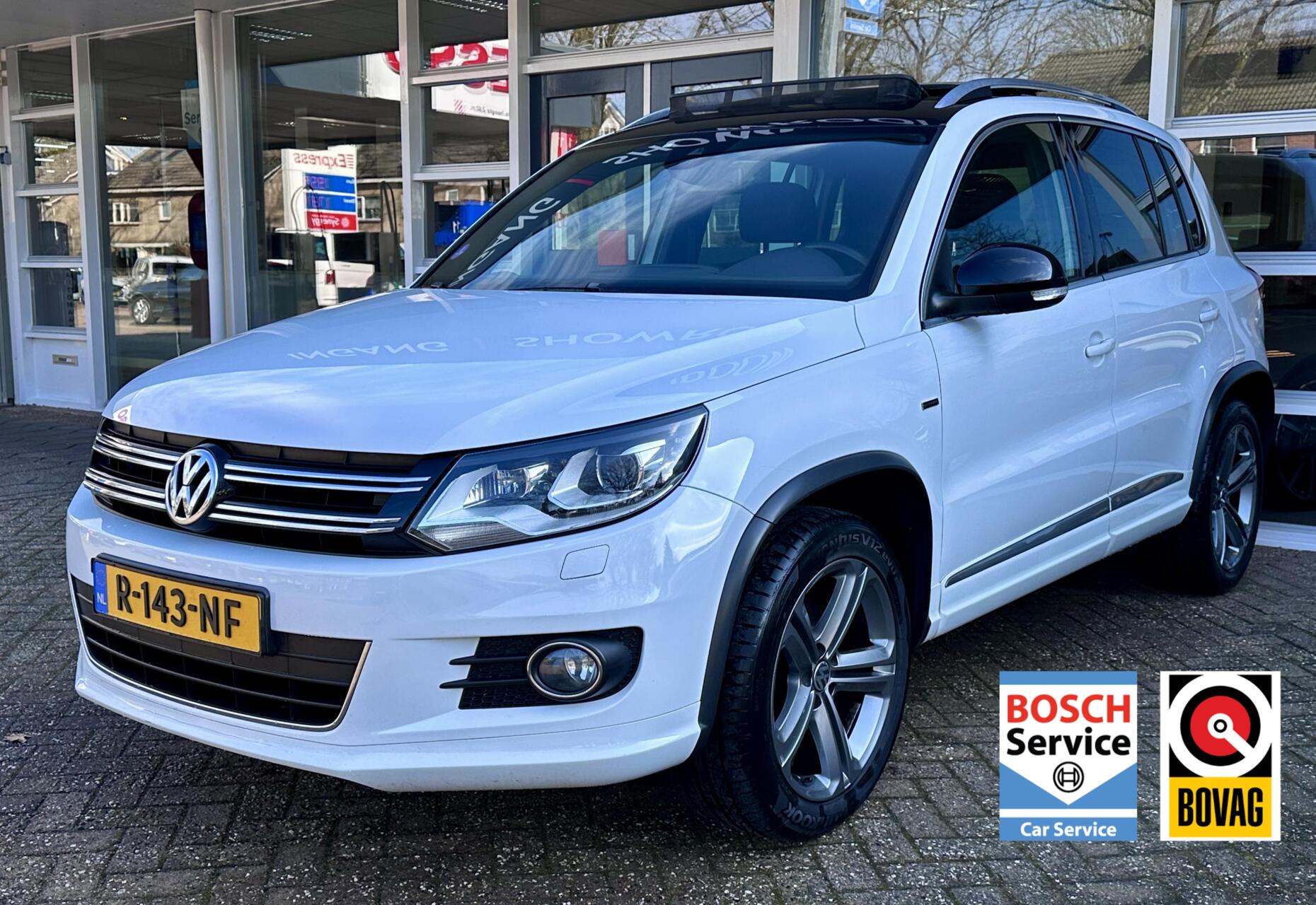 Volkswagen Tiguan 1.4 TSI R-Line Cityscape Xenon/Led, Pano, Bluetooth, Navi, LM.. 2014 - voorkant