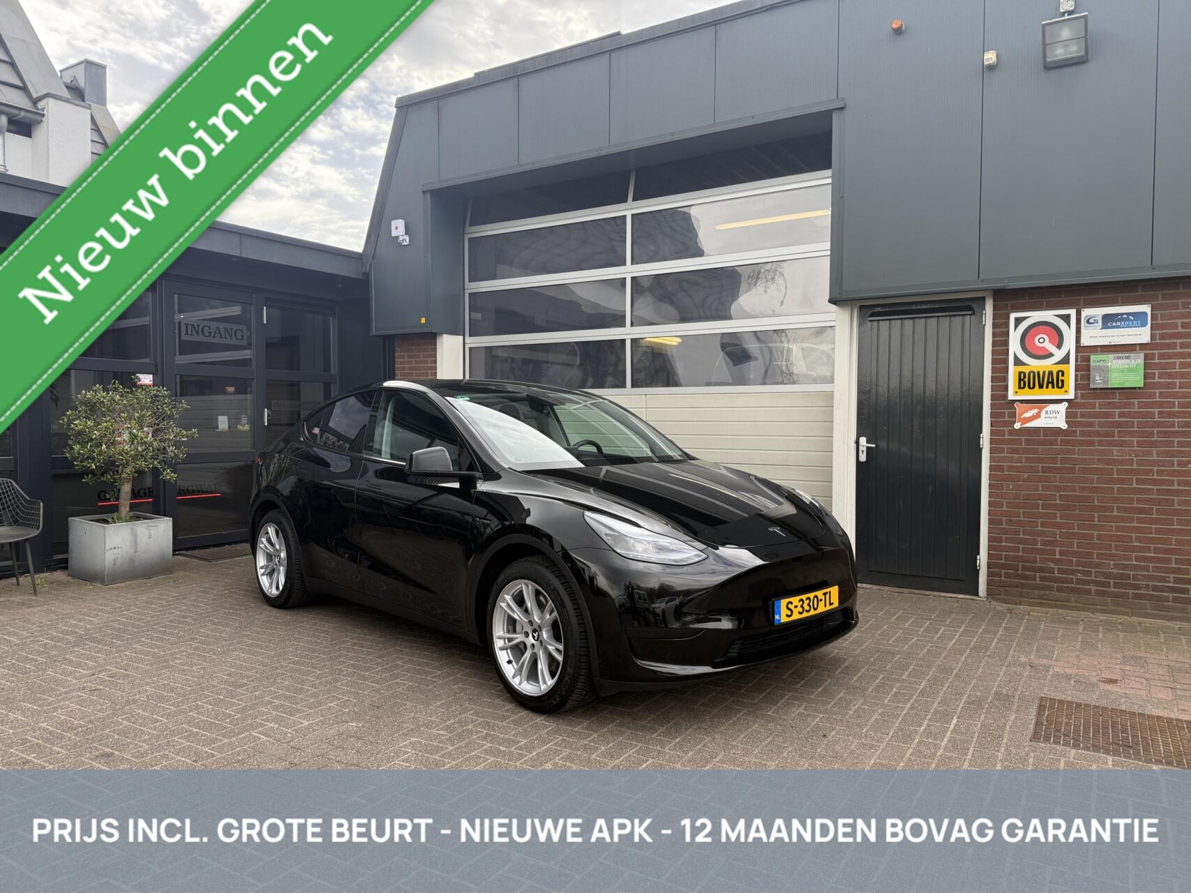 Tesla Model Y RWD 58 kWh SOH 94% LFP/WARMTEPOMP *ALL-IN PRIJS* 2023 - voorkant