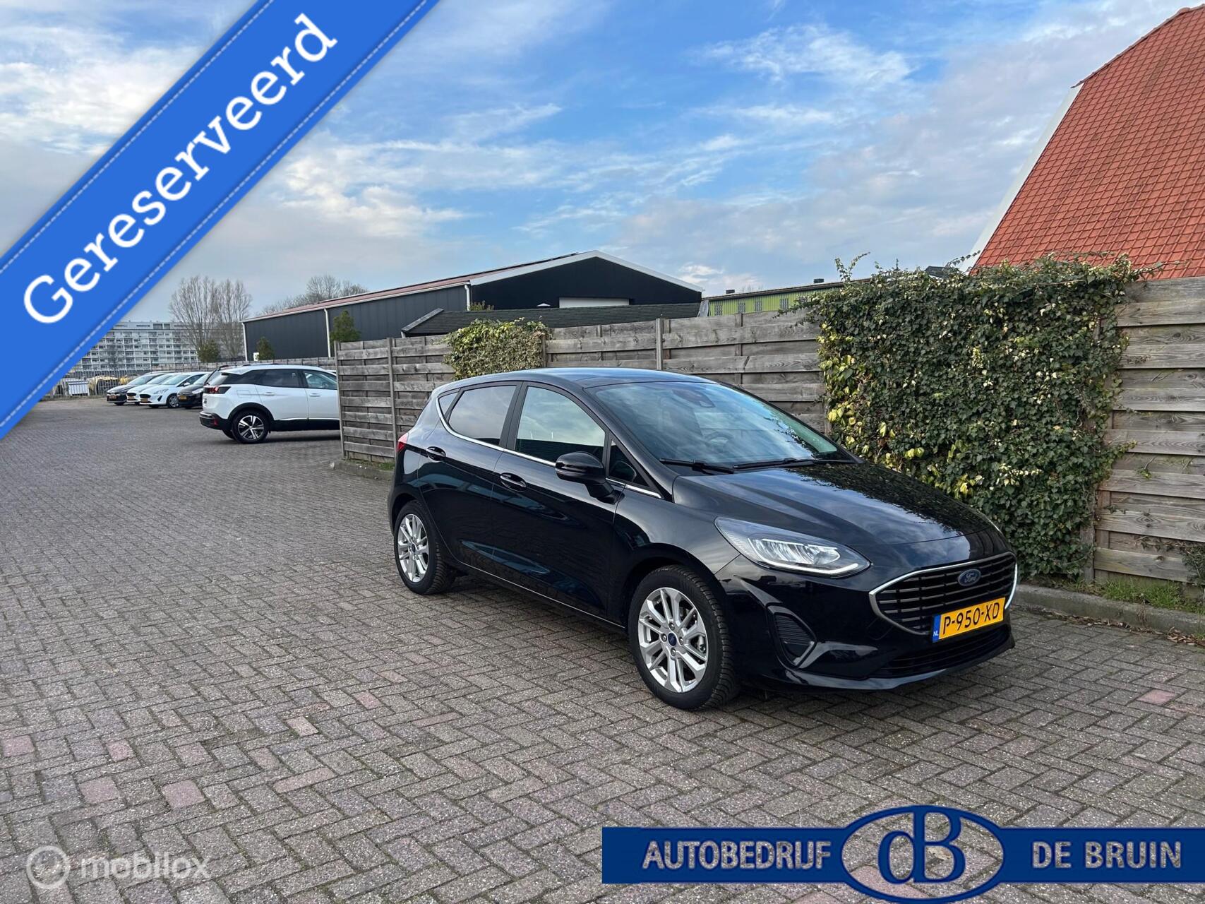 Ford Fiesta 1.0 EcoBoost Hybrid Titanium winterpack, schuifkanteldak 2022 - voorkant