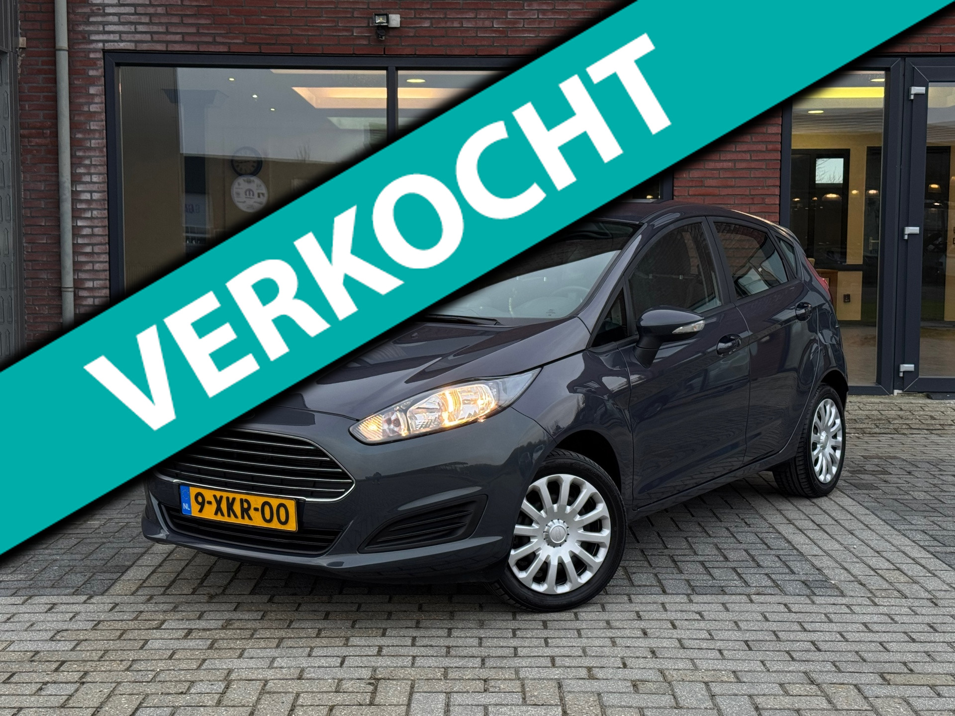 Ford Fiesta 1.0 Style | 23.000KM NAP | Navi | Airco | Dealer onderhouden | 2014 - voorkant
