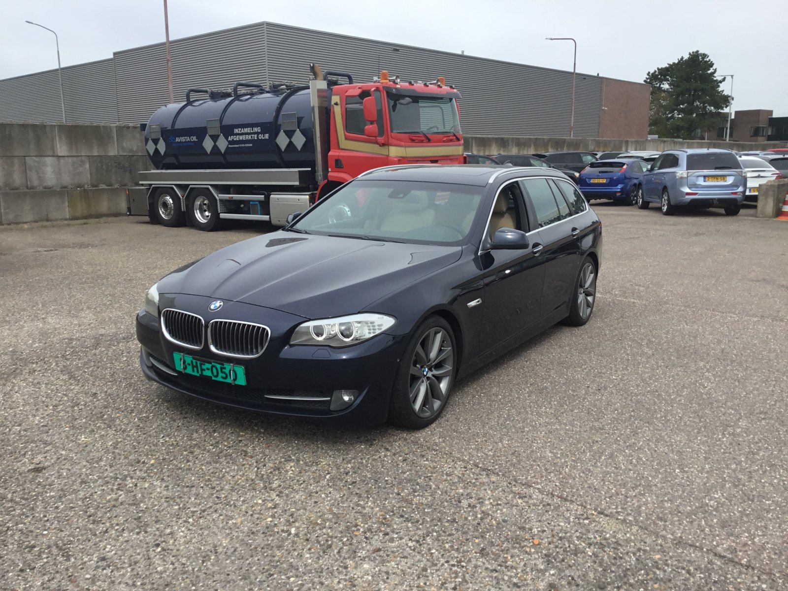 BMW 5-serie Touring 523i High Executive 2011 - voorkant