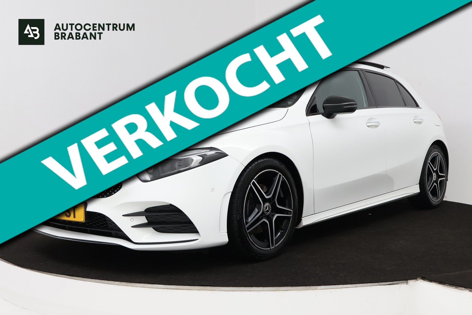 Mercedes-Benz A-klasse 180 Business Solution AMG (PANORAMADAK, STOELVERWARMING, CAMERA, ELEKTR STOELEN, NAVIGATIE, CRUISE CONTROL) 2021 - voorkant