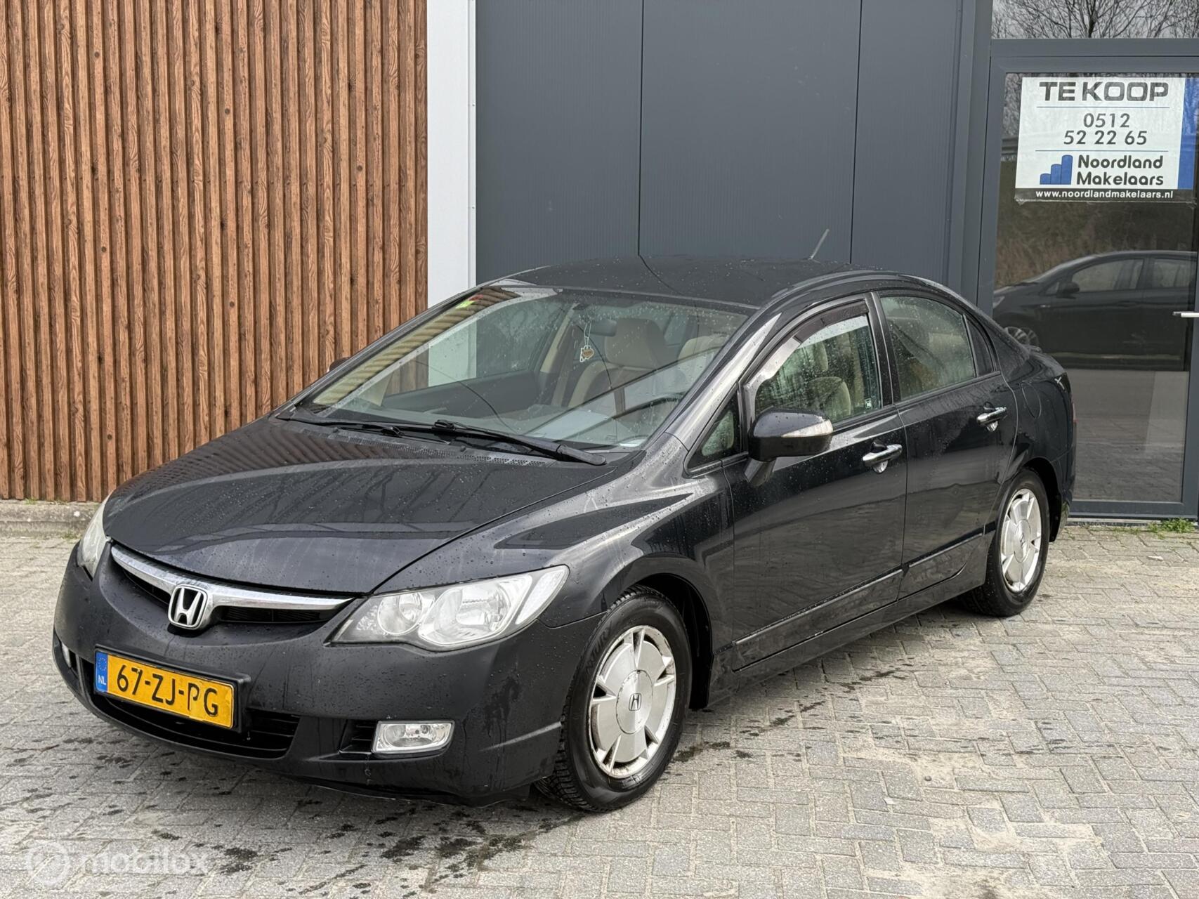 Foto van HONDA CIVIC 4DR HYBRID