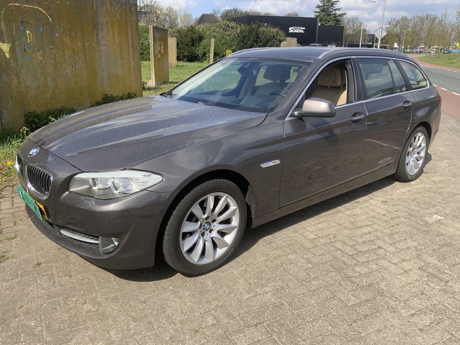 BMW 5-serie Touring 528i High Executive 2013 - voorkant