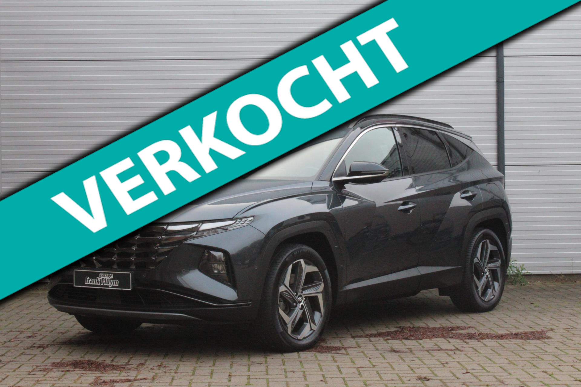 Hyundai Tucson 1.6 T-GDI PHEV Premium 4WD Winterpakket/AppleCarPlay/CAM 2022 - voorkant