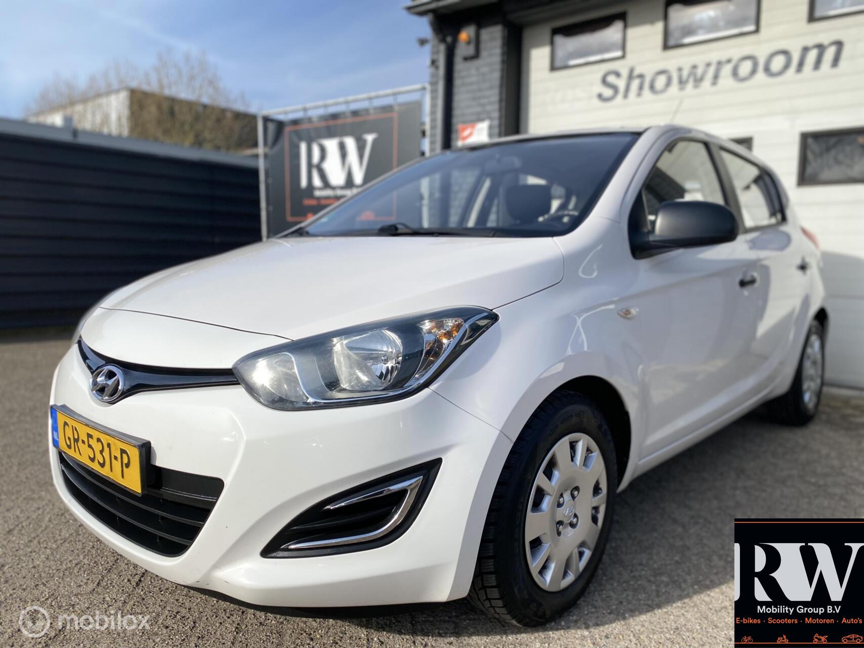 Hyundai I20 1.2i i-Drive *AIRCO*NIEUWE APK* 2013 - voorkant