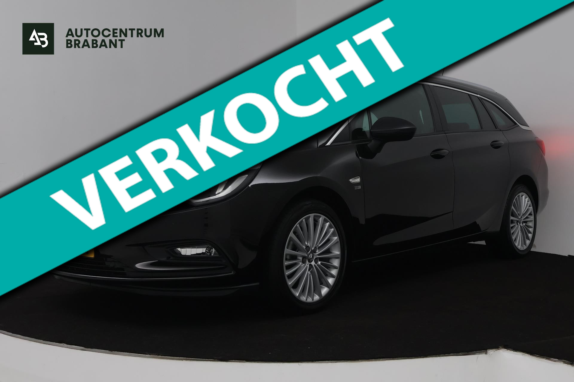 Opel Astra Sports Tourer 1.4 Turbo 120 Jaar Edition (TREKHAAK, PARKEERSENSOREN, CRUISE CONTROL, NAVIGATIE) 2019 - voorkant