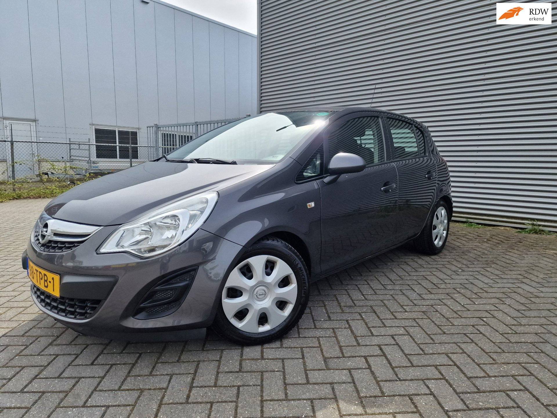 Opel Corsa 1.3 CDTi EcoFlex S/S Business NAVI CRUISE 2012 - voorkant