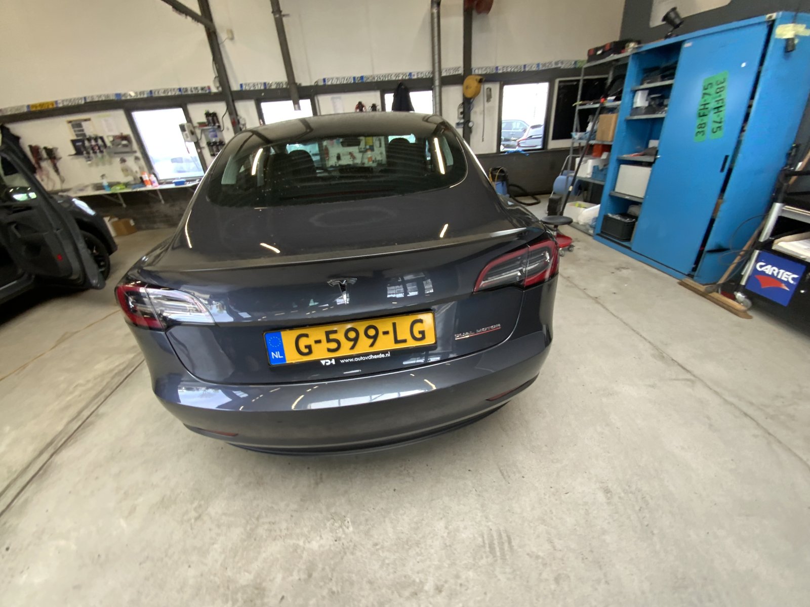 Inspectiefoto van Tesla Model 3