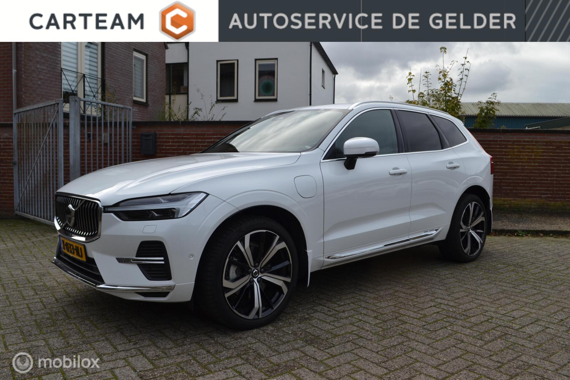 Volvo Xc60 2.0 T6 Plug-in hybrid AWD Ultimate Bright | Head-up | Stoel + Stuurverwarming | Trekhaak | 360 gr camera | HK Audio | 2023 - voorkant