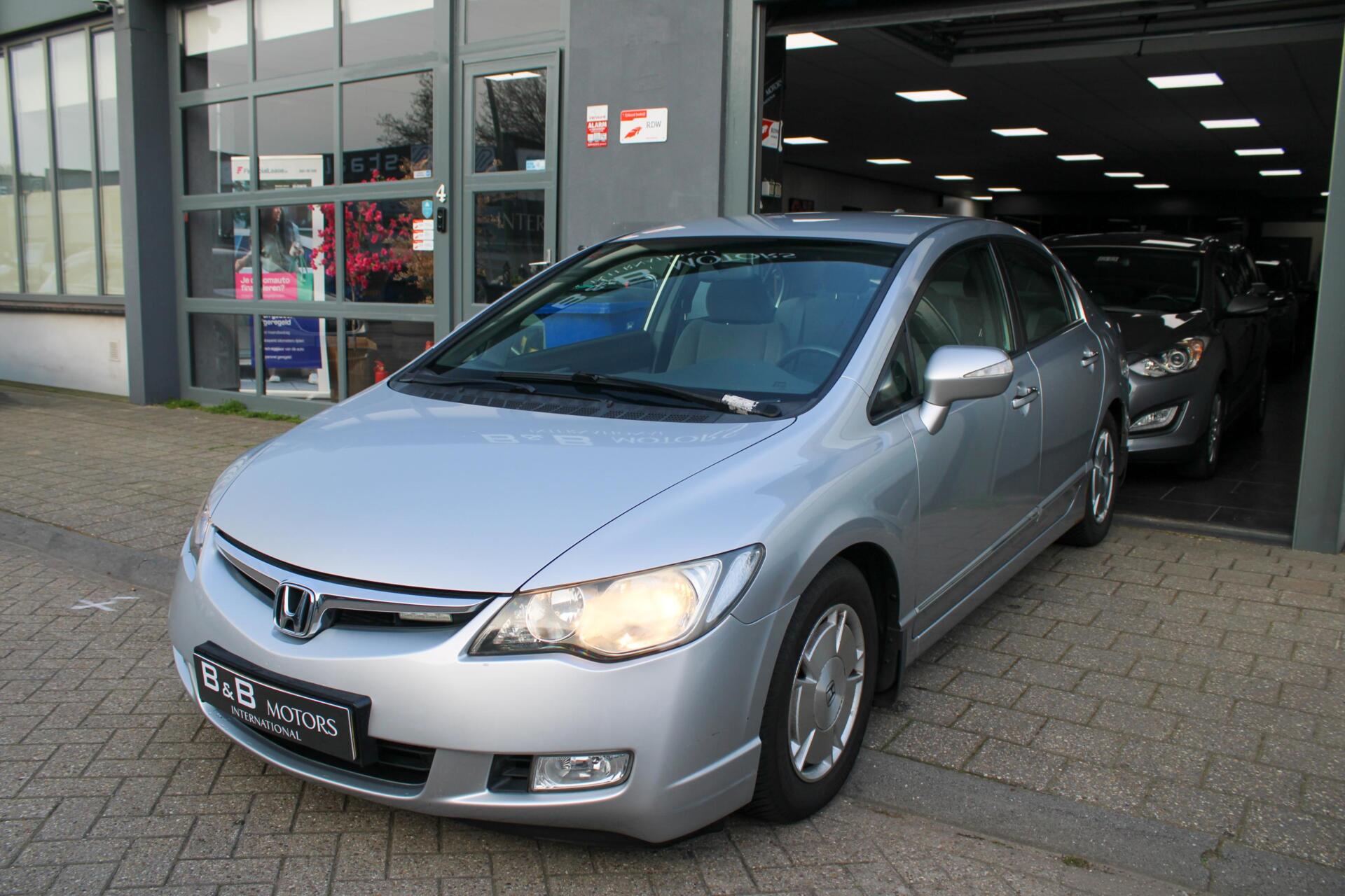 Foto van HONDA CIVIC 4DR HYBRID