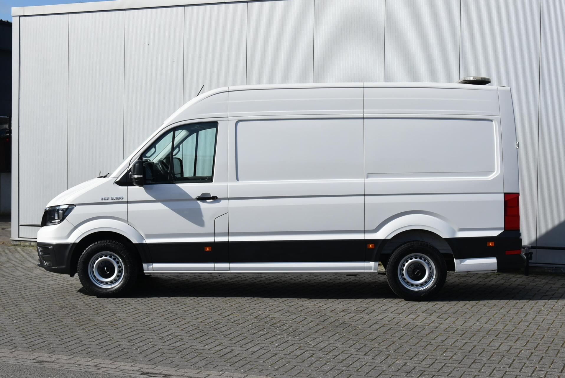 Foto van Man Tge